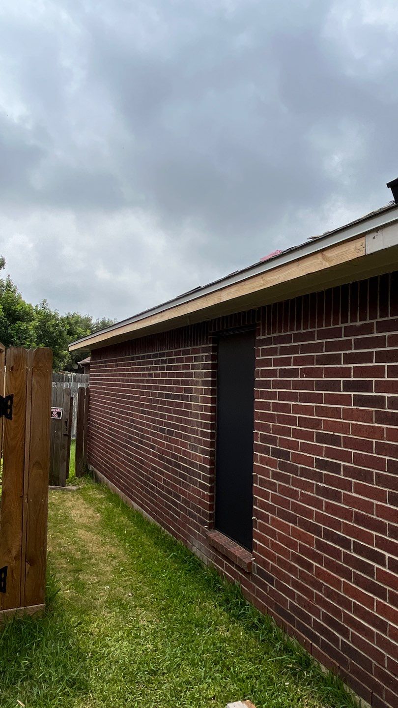 Nothing looks nicer than a little black roof by Bayfront Roofing and Construction