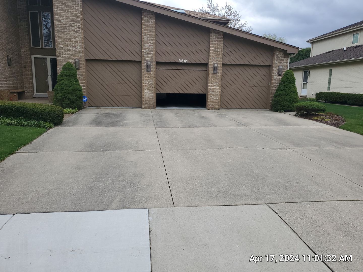 concrete patio and driveway cleaning by Northern Power Washing LLC.