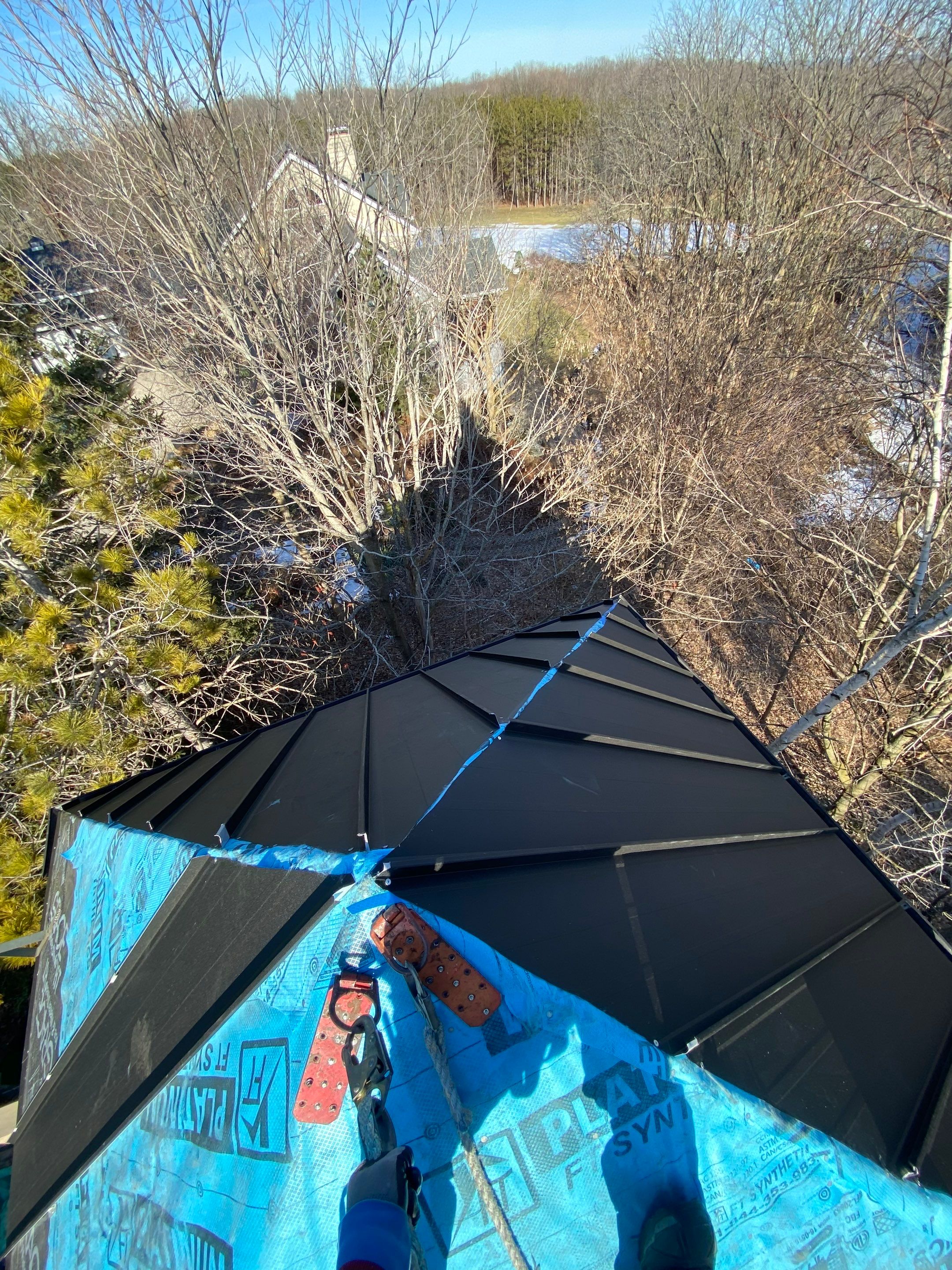 Residential Roofing Installation using 24 Ga Standing Seam Metal by Jay Carter Roofing & Sheet Metal