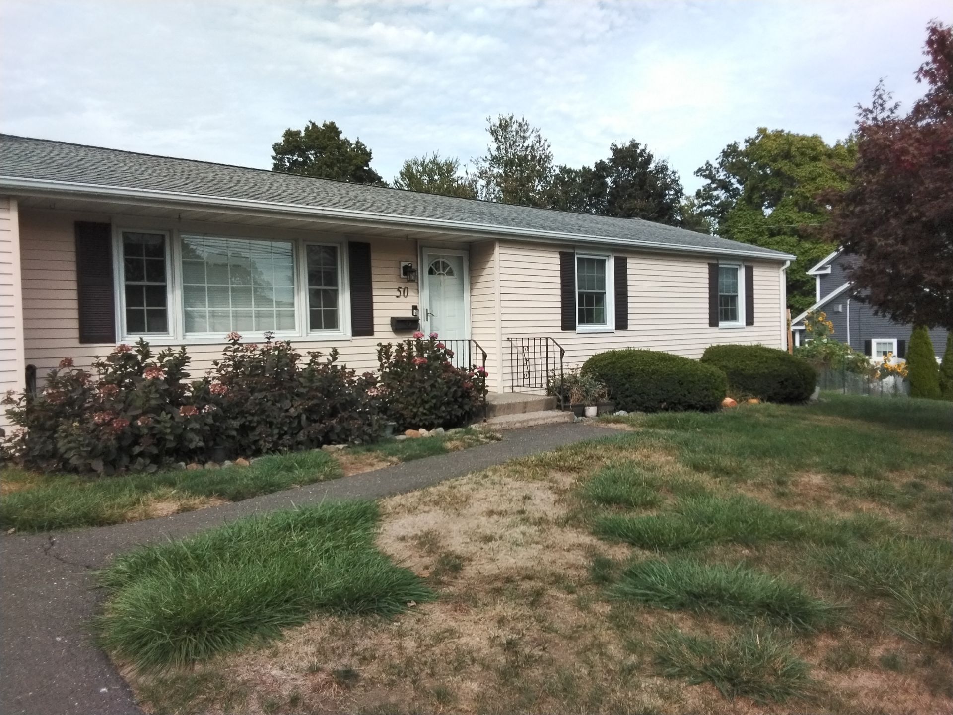 Transformative Siding update with Cert. Monogram D/4 x 12'6" Clapboard, Heritage Cream by DiGiorgi Roofing and Siding Inc