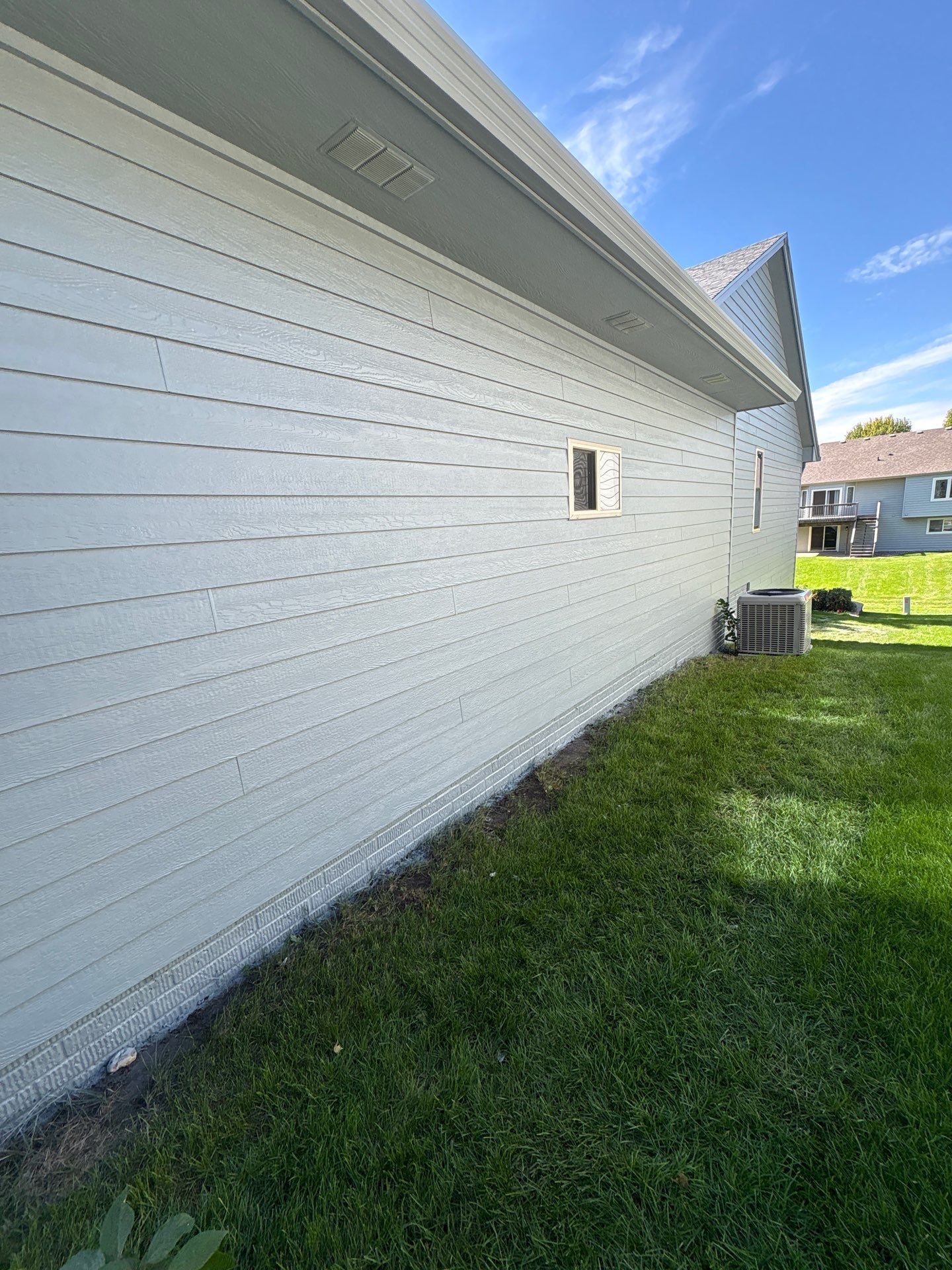 Exterior Painting for Vinyl Siding and Trim in Sioux Falls by Select Painting, Coatings & Garage Cabinets