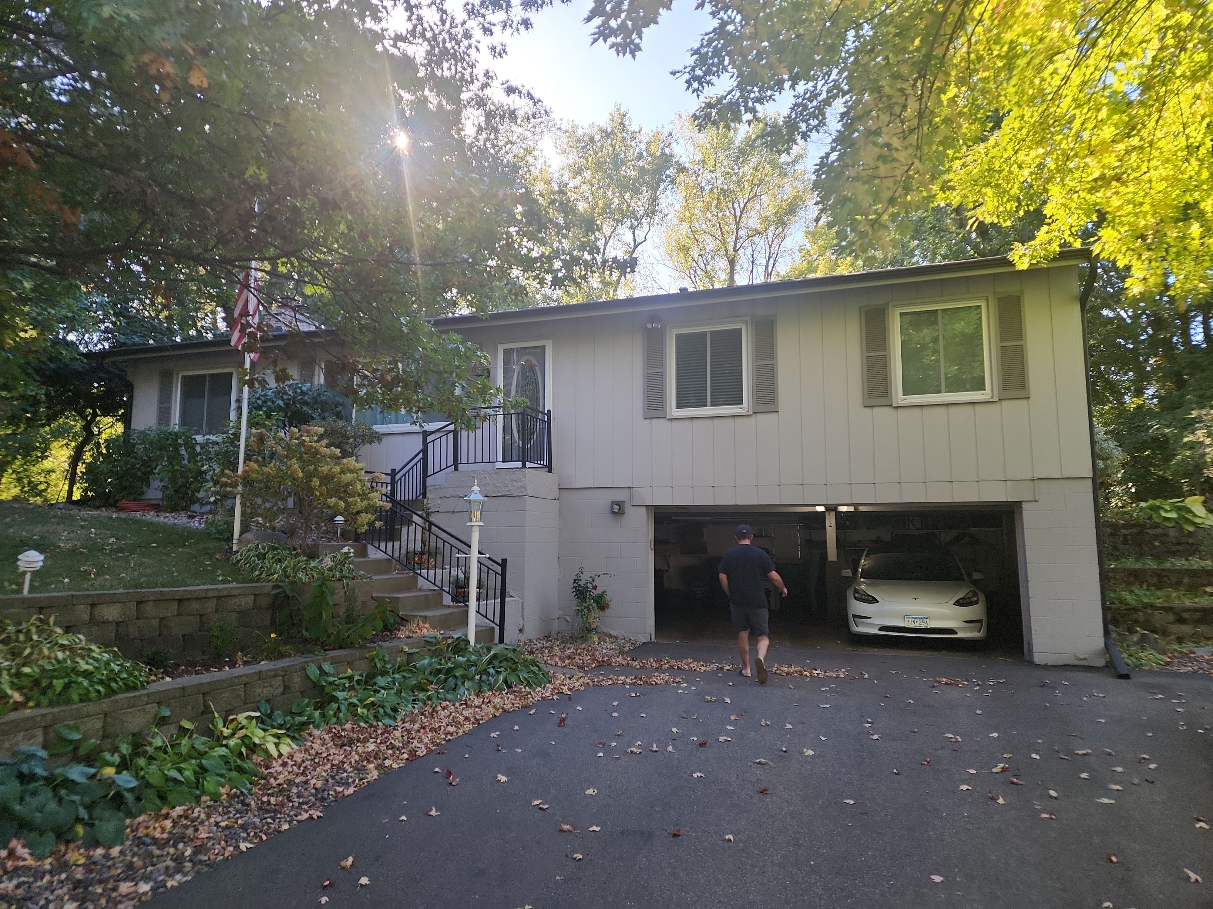 Premium Exterior Remodel – Alside Charter Oak Siding, Hayfield Black Frame Windows, Edco Soffit & Fascia by First Impressions Exteriors