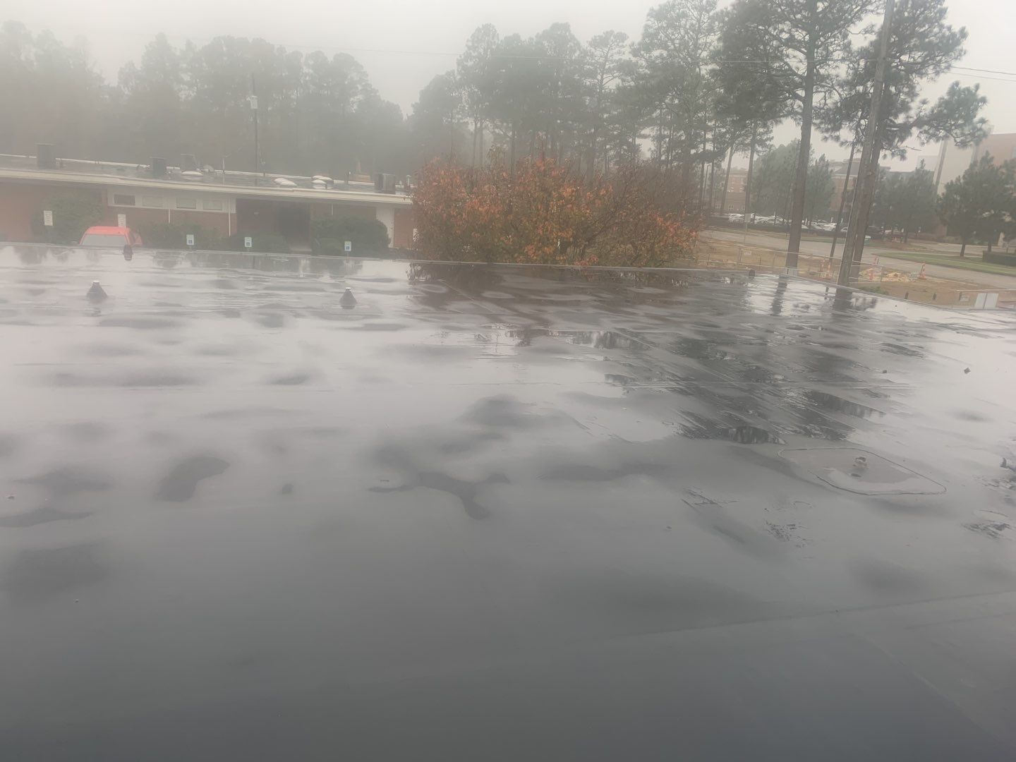 Re Roof (TPO) by American Roofing NC