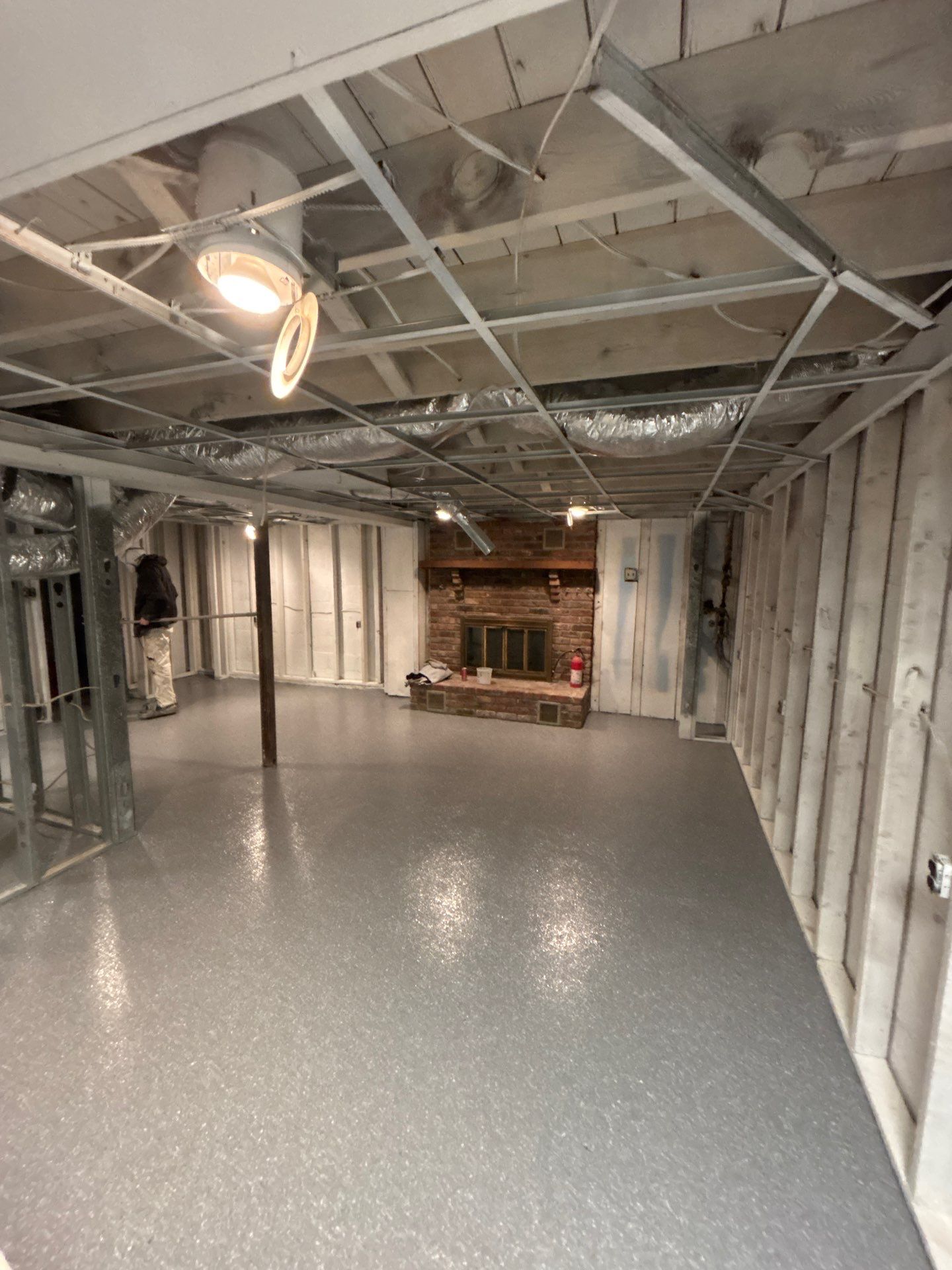 Basement Concrete Floor Coating with Penntek Flake System by Spectrum Painting, LLC
