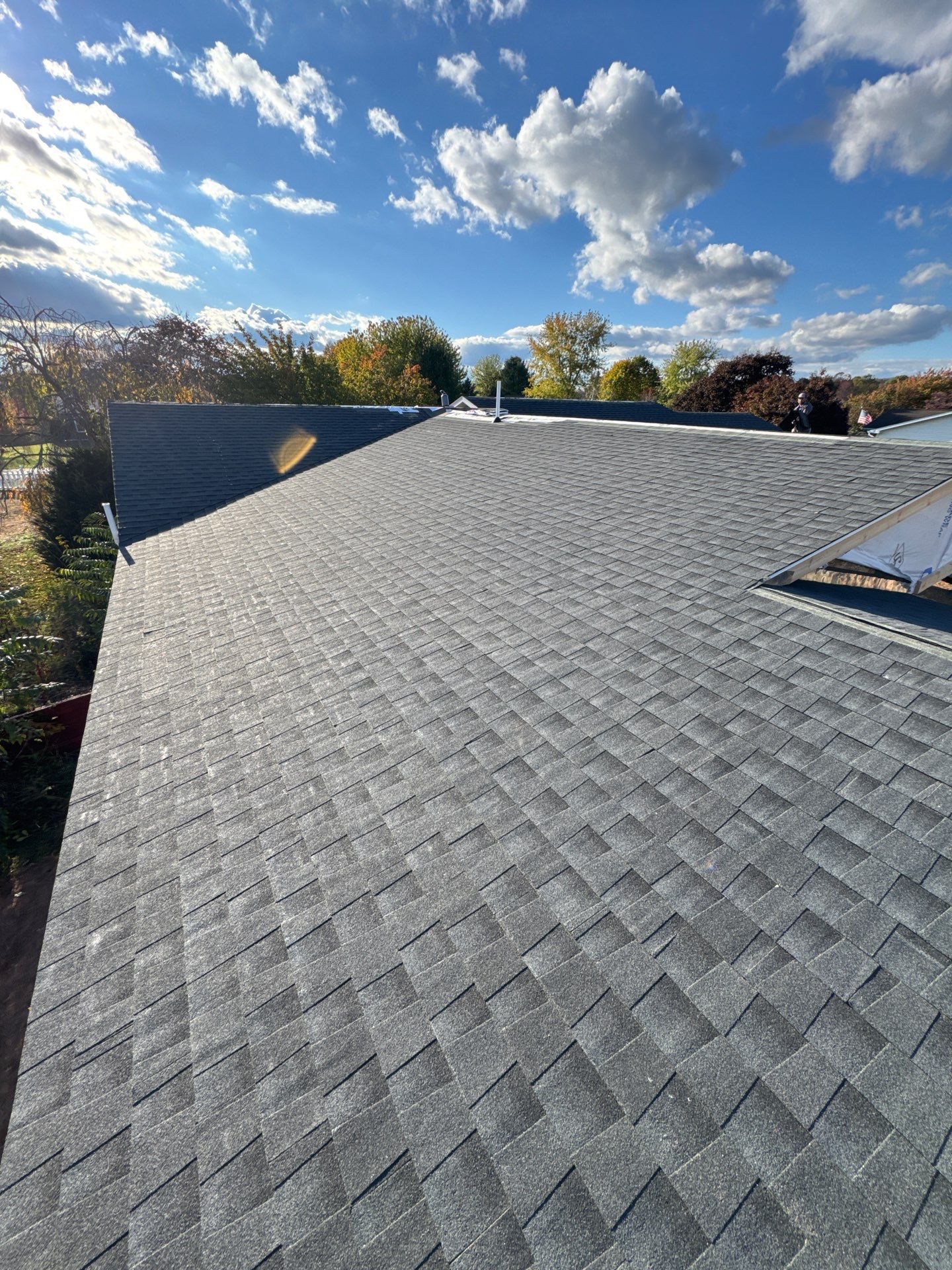 Residential Addition and Covered Porch Roof  by Esh Builders