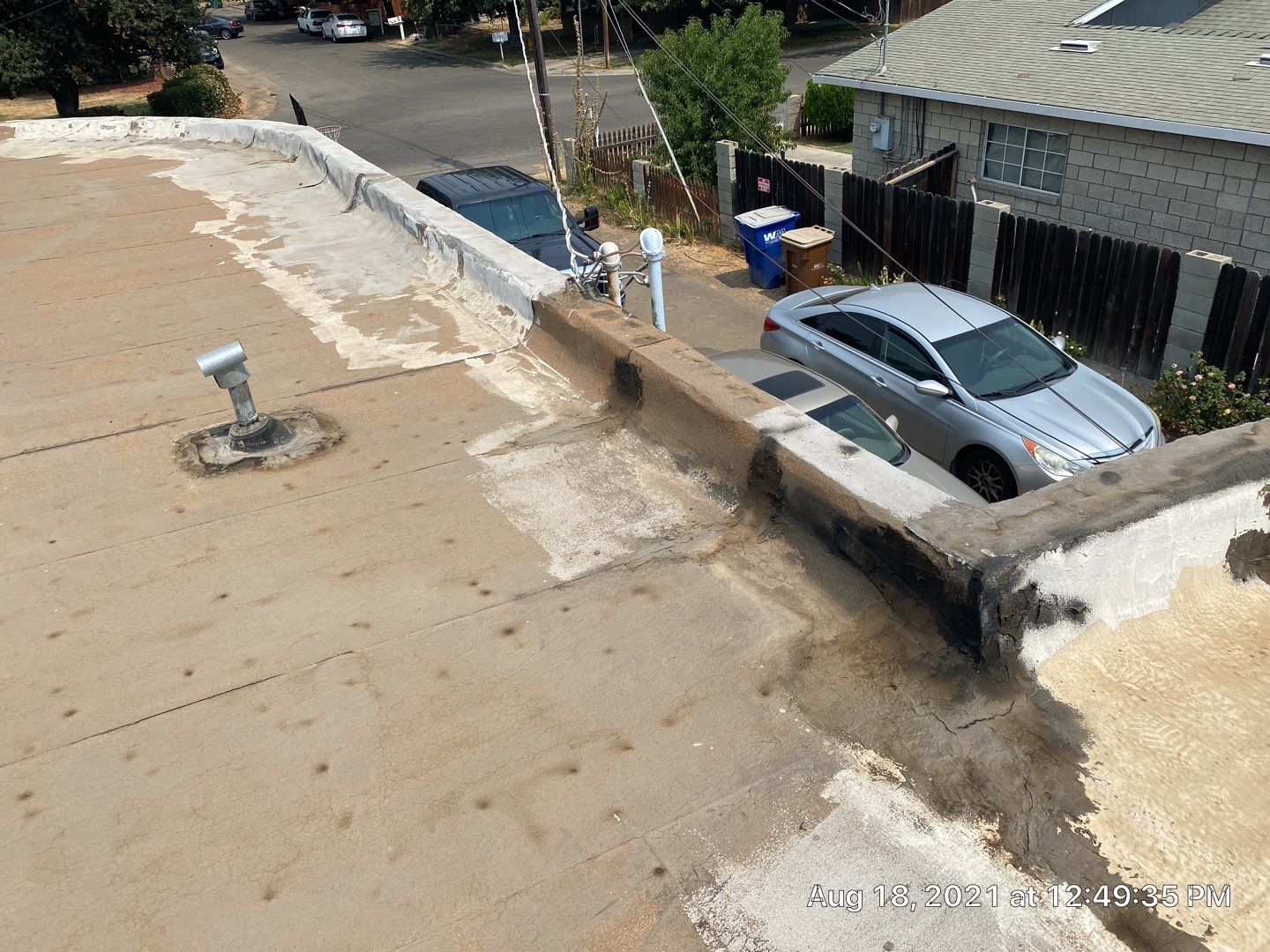 Residential Roofing Installation using Spray foam roofing insulation and General Coatings acrylic coatings by Straight Edge Roofing Inc