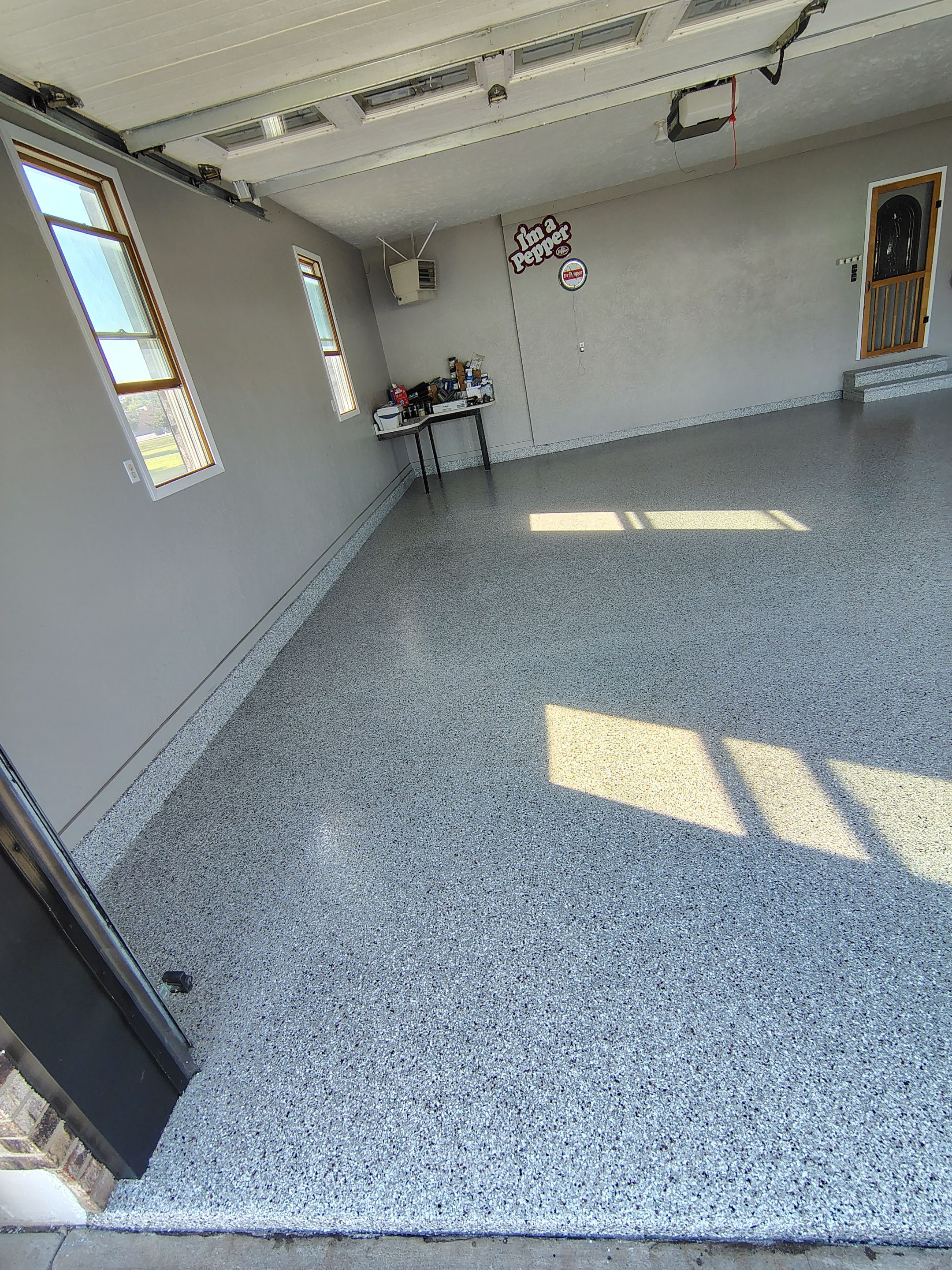Garage Concrete Floor Coating and Crack Repair in Onawa by Select Painting, Coatings & Garage Cabinets