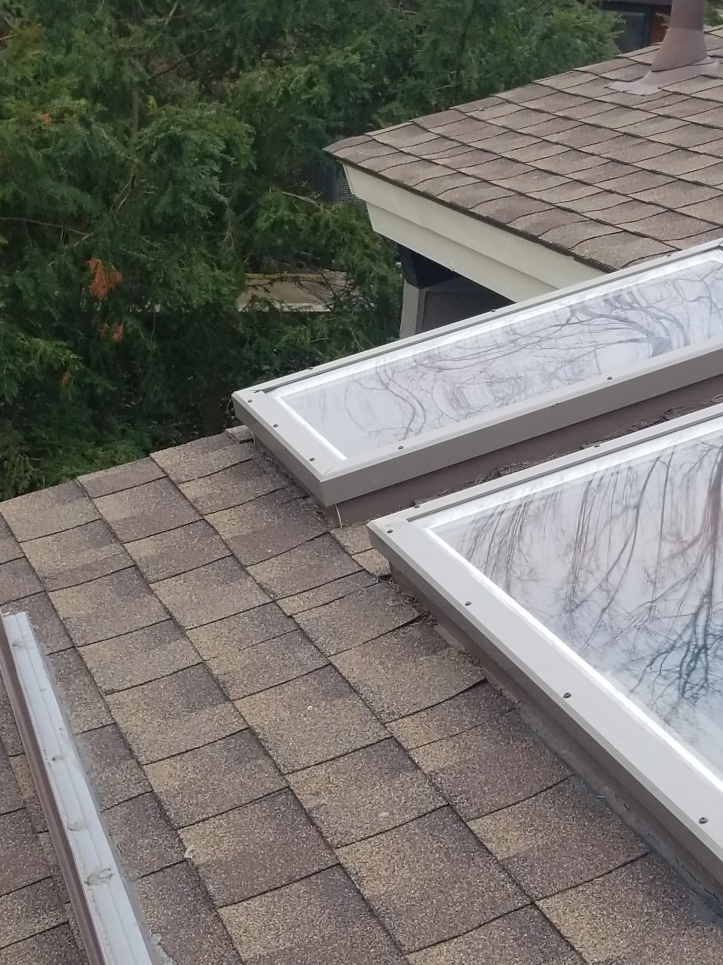 Velux Skylights, GAF Roofing, Front Porch Overhang by Northwest Construction