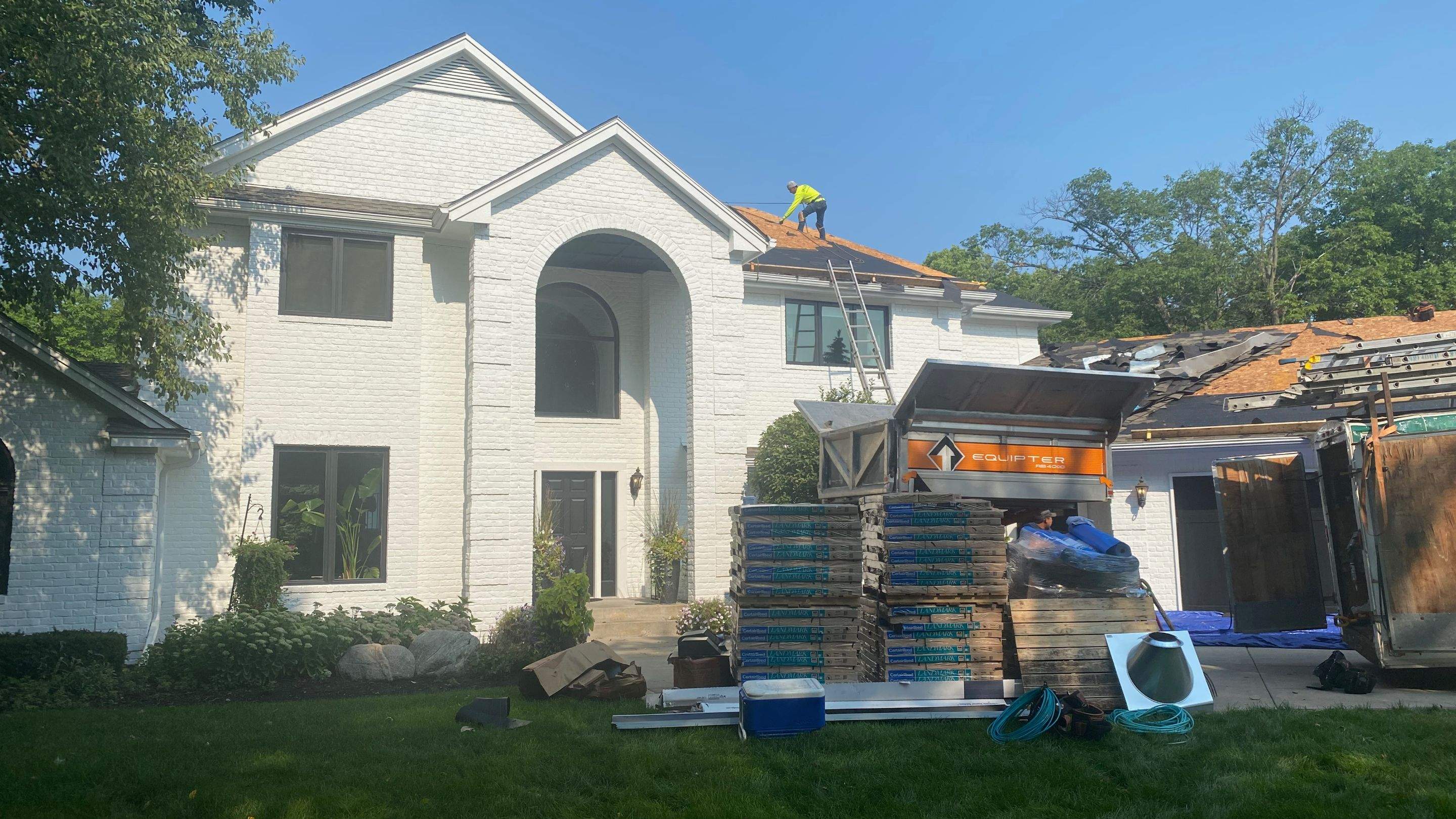 Residential Roofing Installation using Certainteed Landmark Moire Black by MODERN EXTERIOR SYSTEMS
