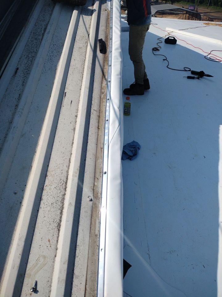 Office Building in Magnolia by Hostetler Roofing
