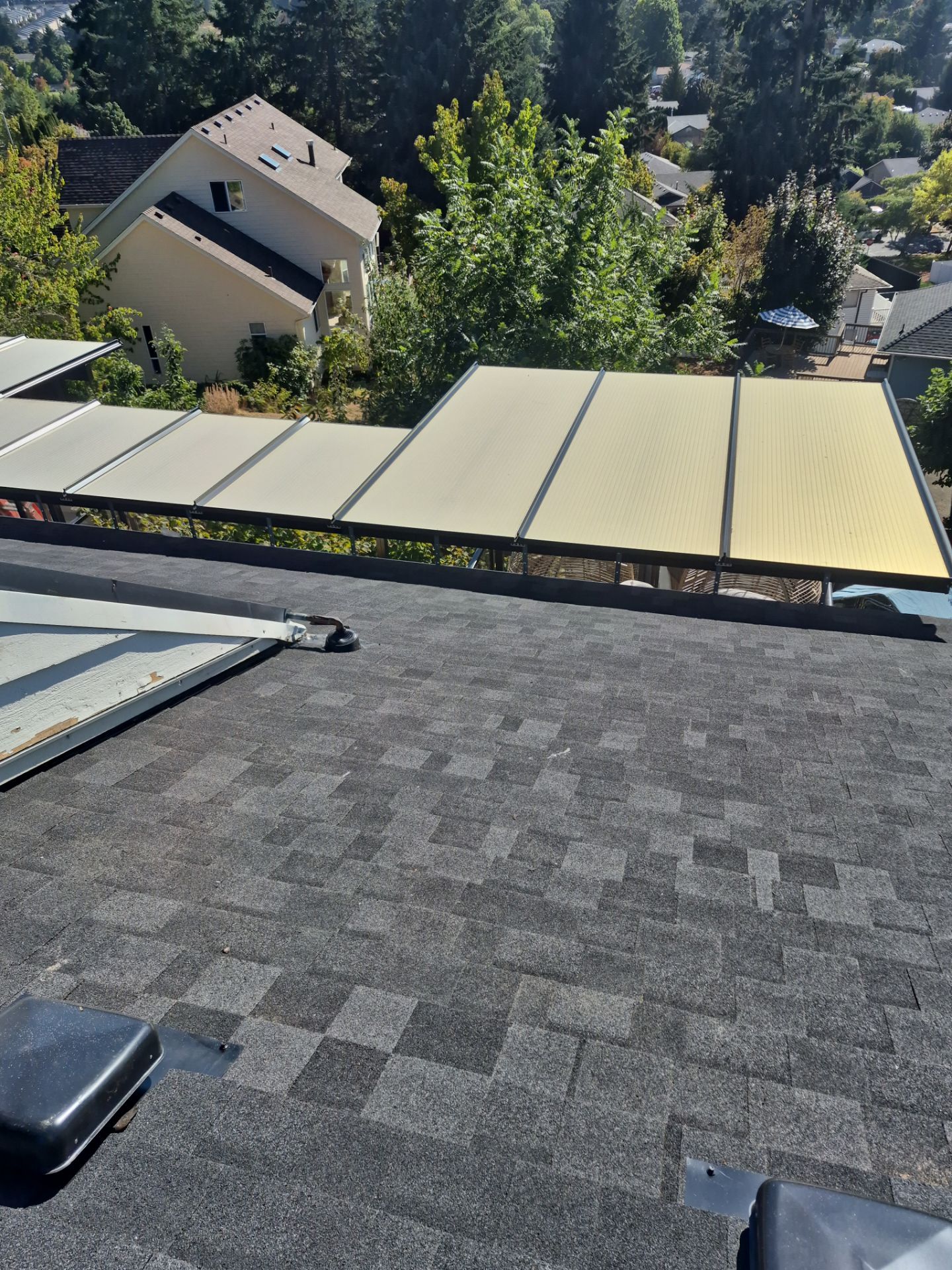 Granite Black Residential Roof Replacement by Orezona Building & Roofing Company, Inc.