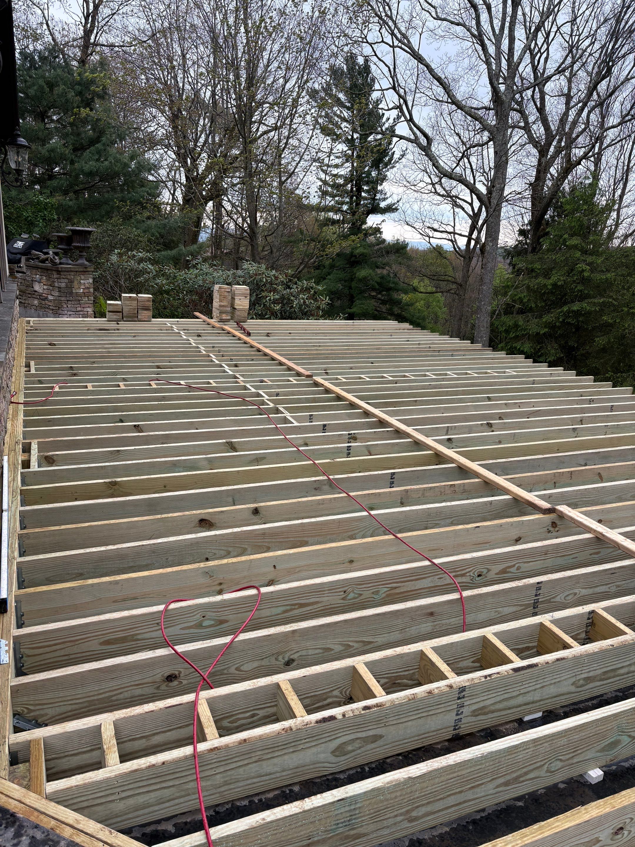 1500 sq/ft Composite Deck Build with Outdoor Kitchen in Champion by Cousins Roofing Siding & Decks