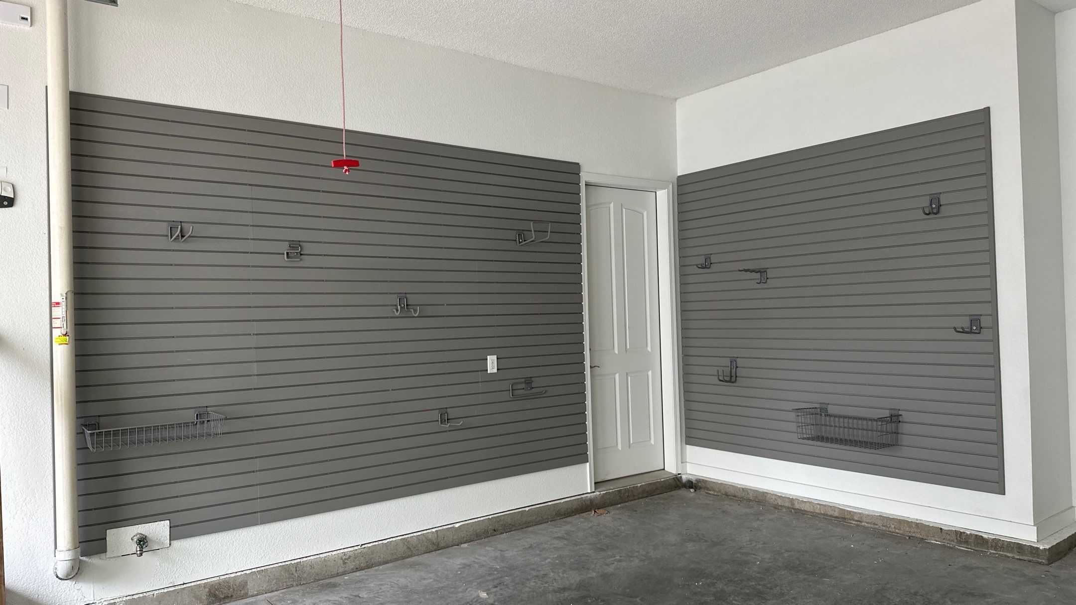 Brooke L. added cabinets for a clean storage look by Banner Garage