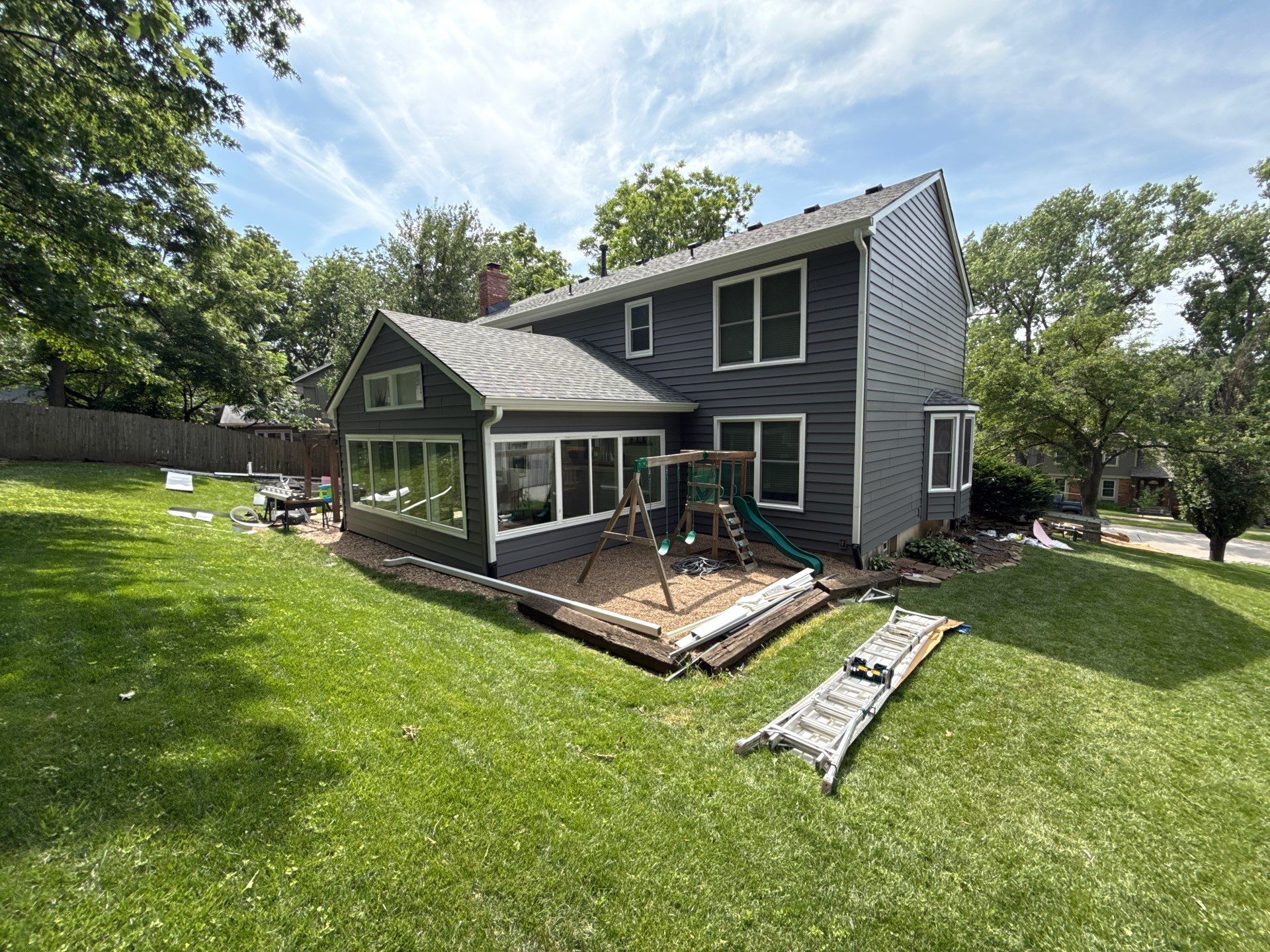 Full Exterior Siding Upgrade and Board and Batten Installation in Shawnee by EEC Windows, Siding & Roofing