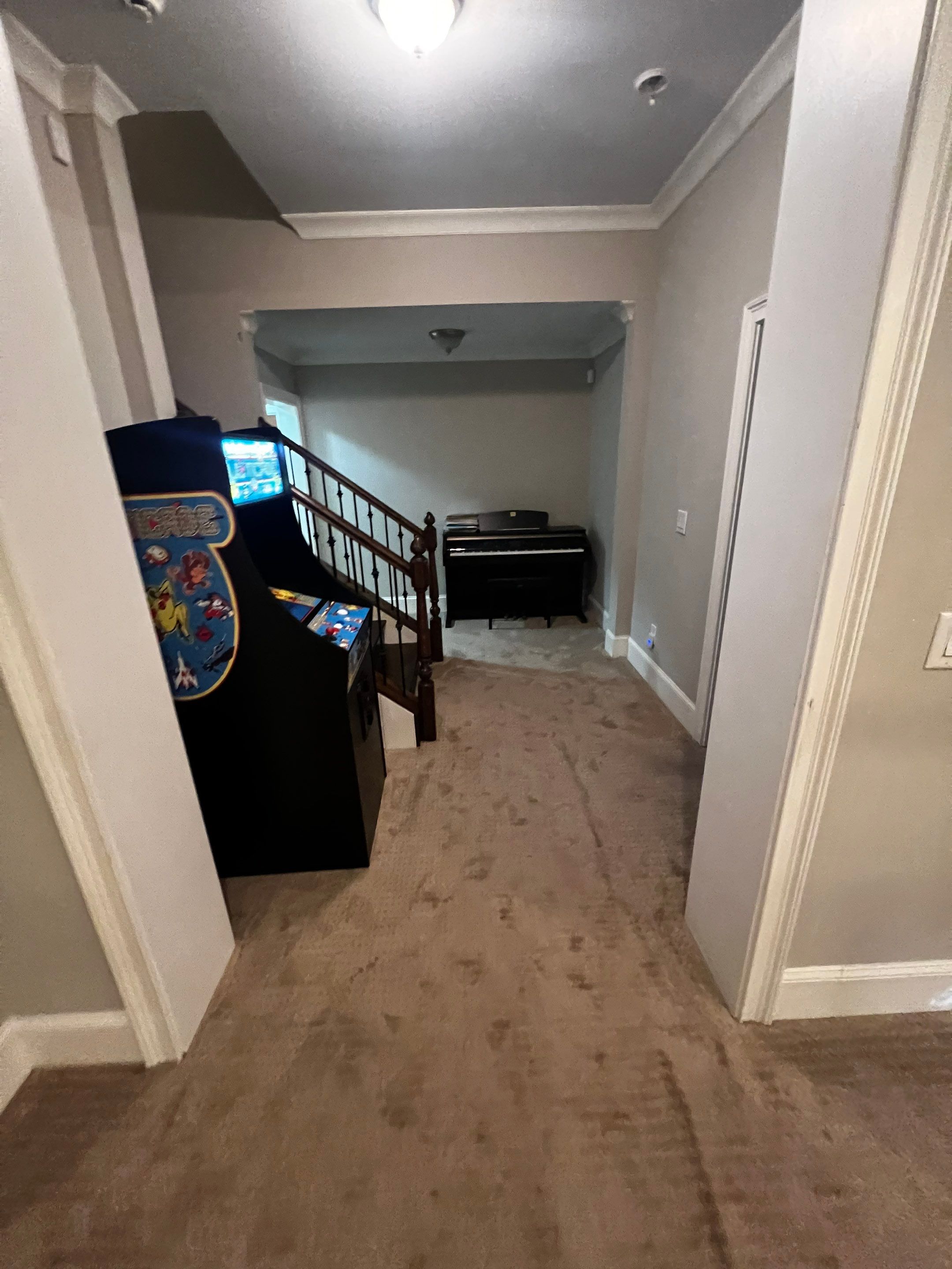 Atlanta Basement Refinishing with Wood Laminate Flooring and Interior Painting by Swift Home Renovations