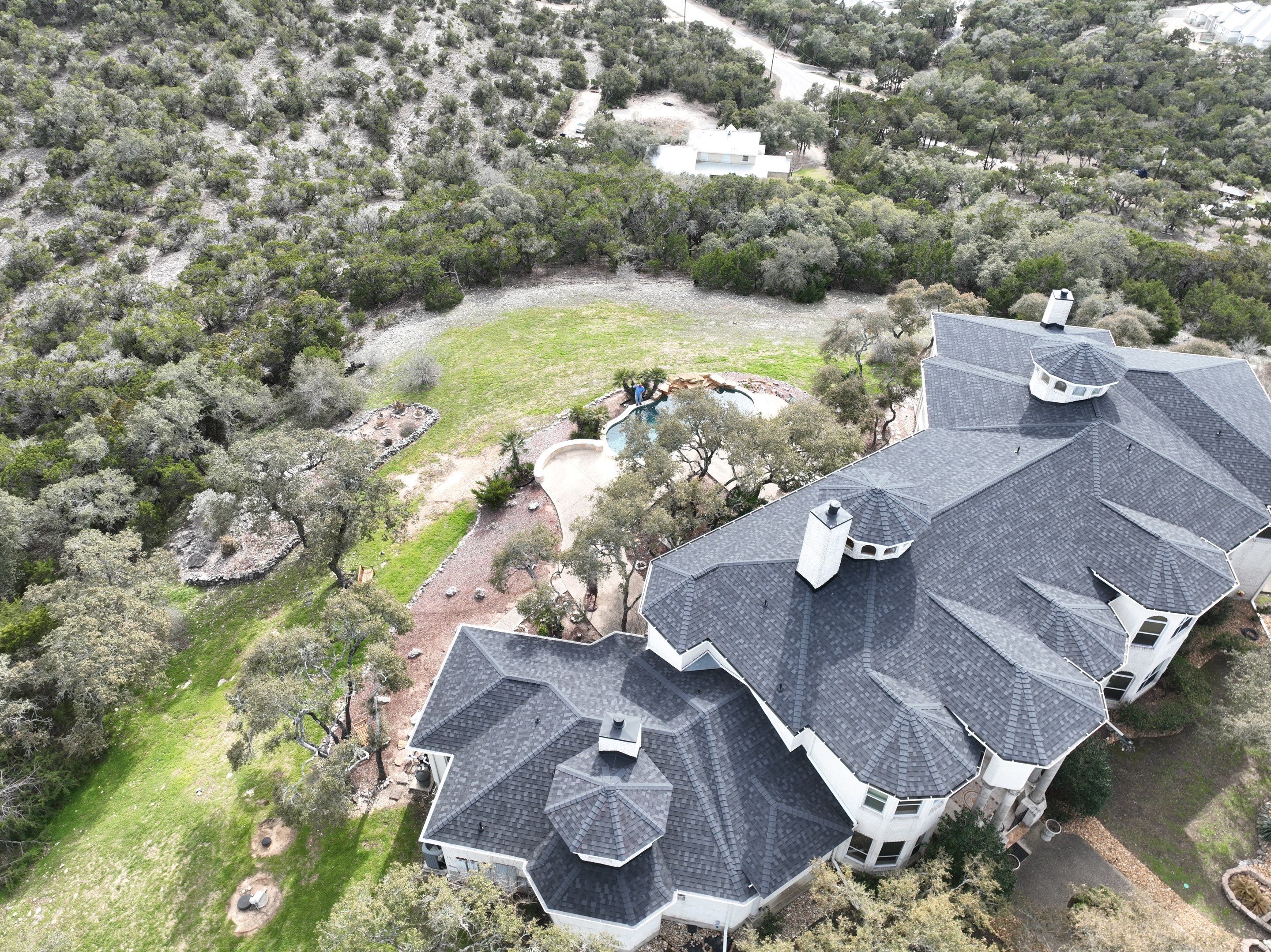 Residential Roof Replacement using 30 Year Laminate Shingles with High Profile Ridge by Premier Roofing and Contracting