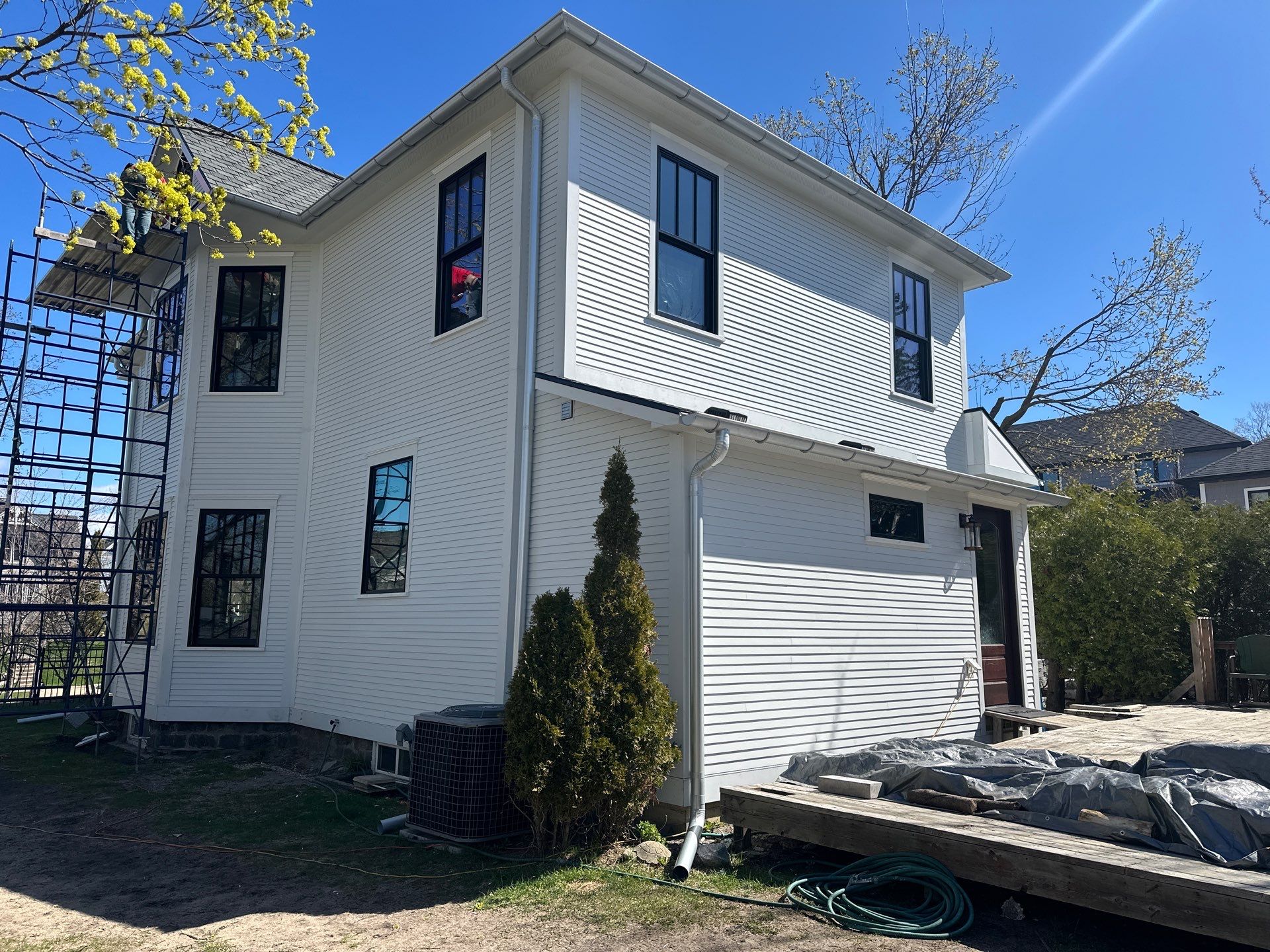 New Galvalume Half Round Gutter Installation for Petoskey Residential Home by Rainbow Seamless Systems