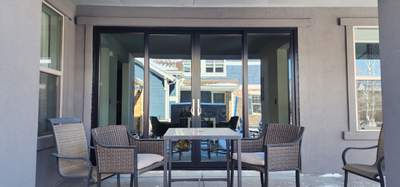 Open your space up to the outside! 4 Panel Patio door replacing 2 windows by 1st choice windows and siding