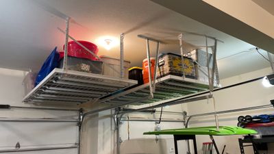 Stacy T. adds ceiling racks to garage for extra storage!