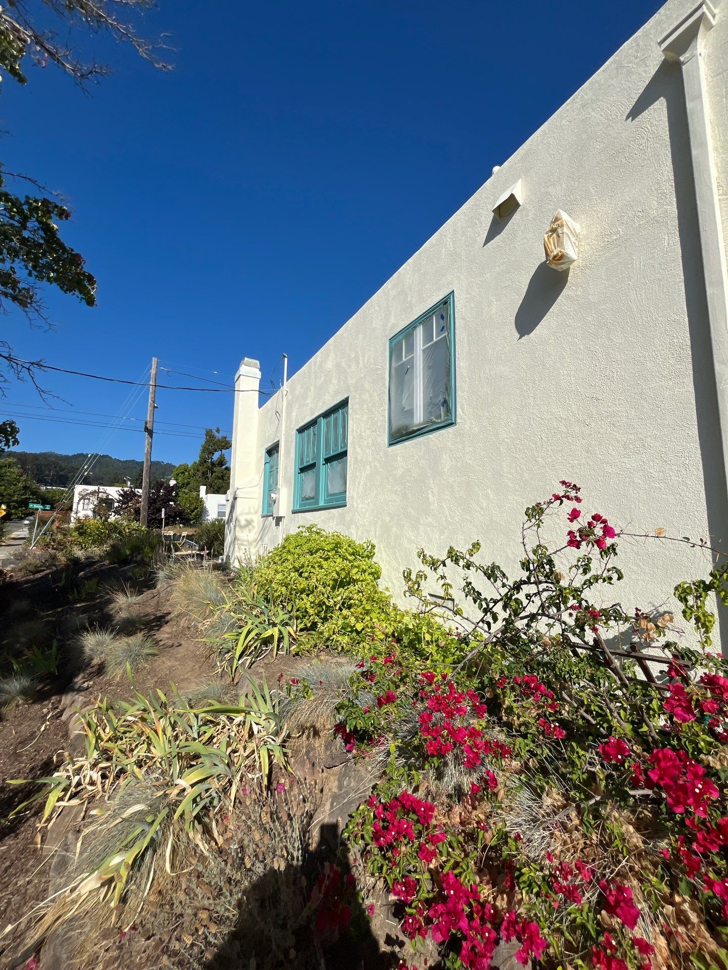 Exterior Transformation with Fresh Stucco and elastomeric system for waterproofing by Herrera’s Bay Area Painting inc.