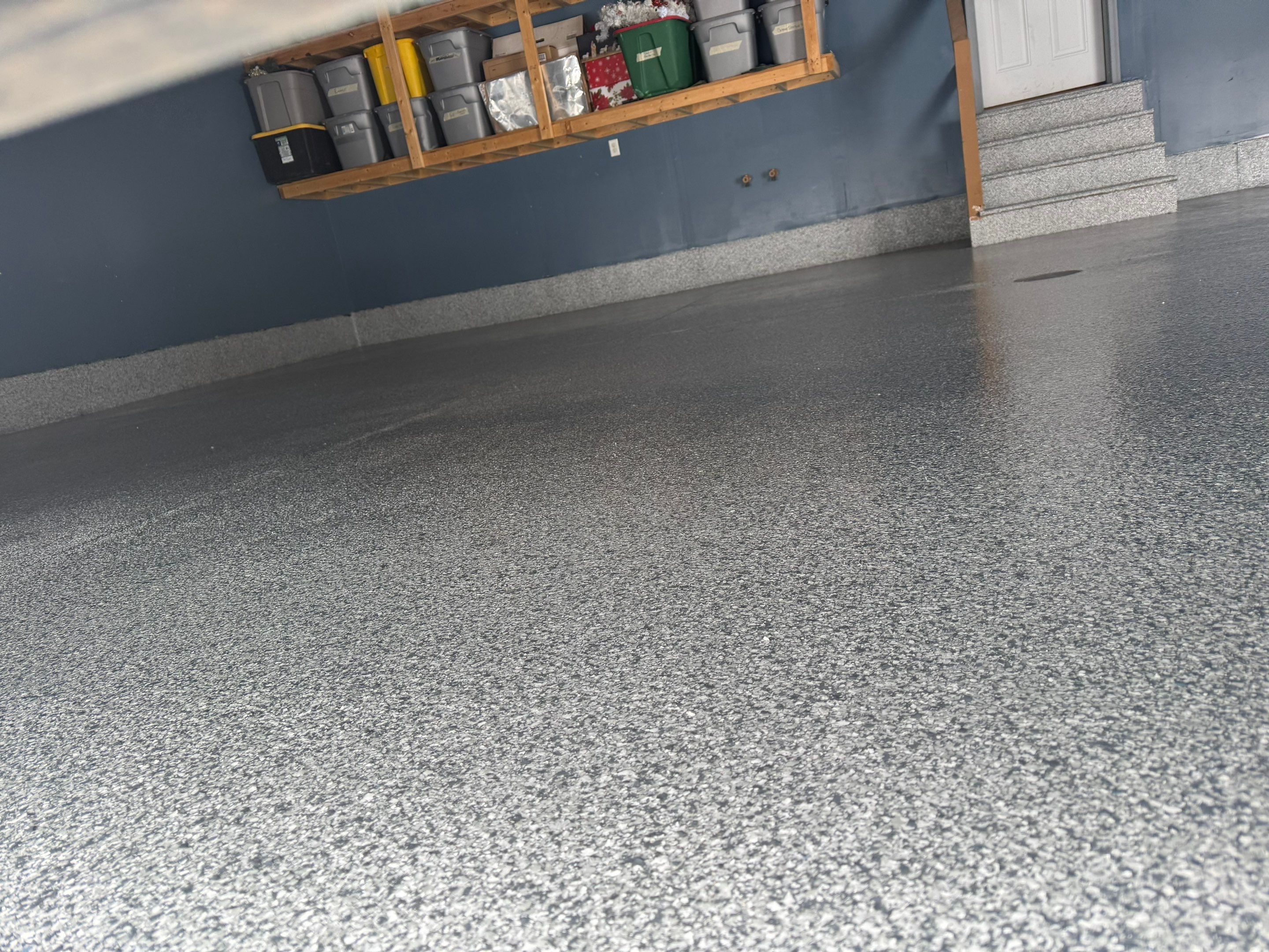 Grey Speckled Epoxy Garage Floor and Stair Coating in Sioux Falls by Select Painting, Coatings & Garage Cabinets