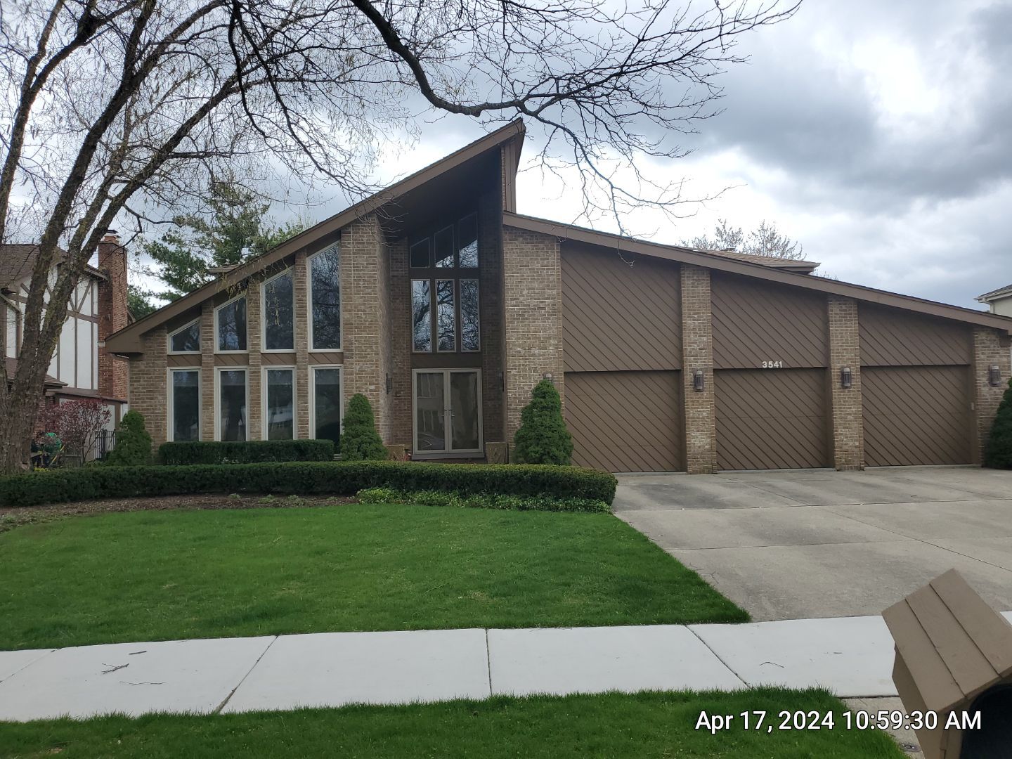 concrete patio and driveway cleaning by Northern Power Washing LLC.