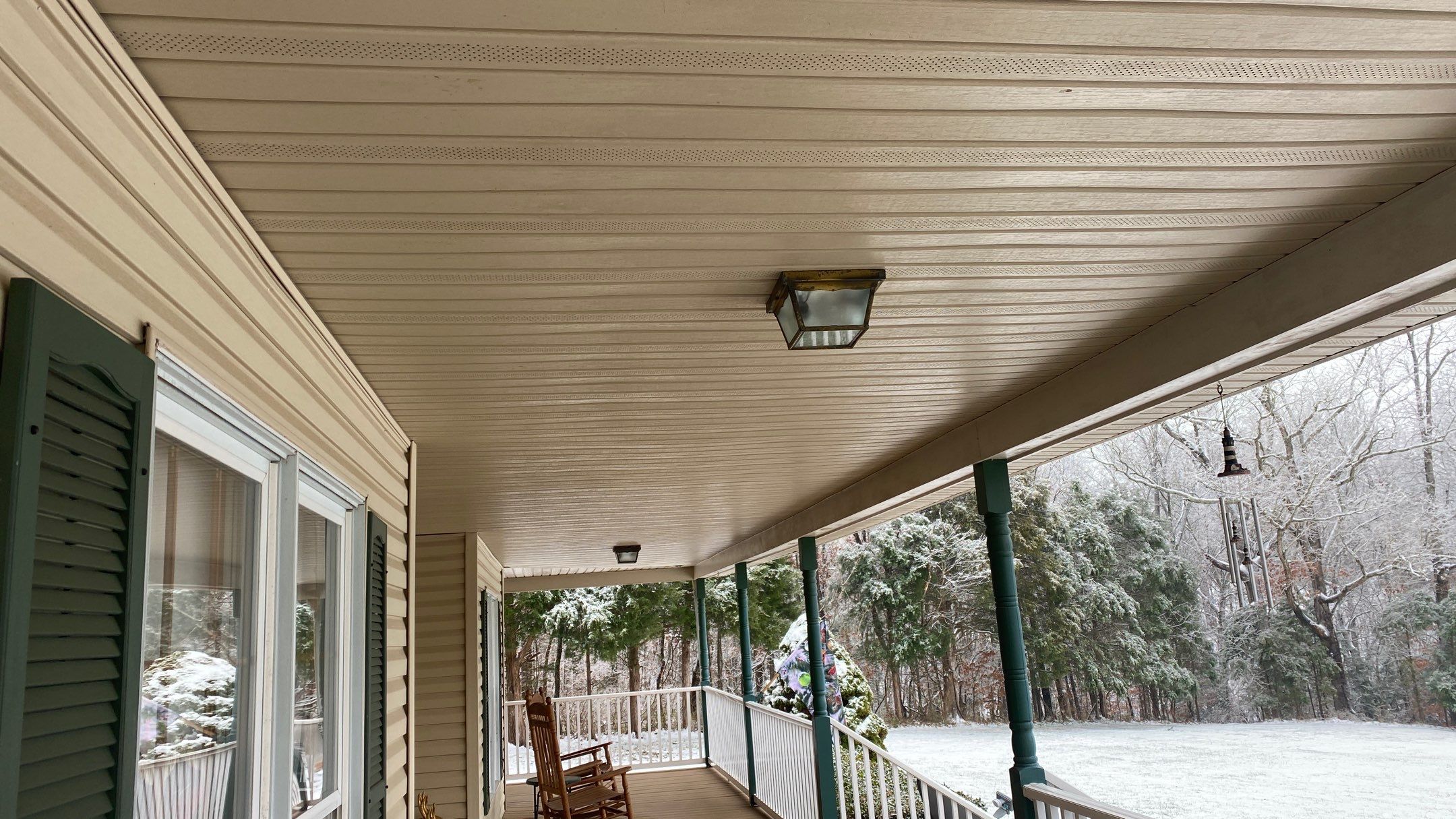 Exterior remodel including window replacement by American Home Contractors