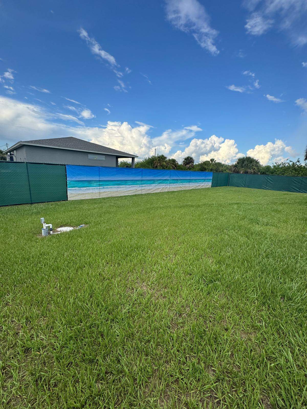 Chain Link Fence Installation with Custom Beach Privacy Screen in Port Charlotte by True Fence LLC