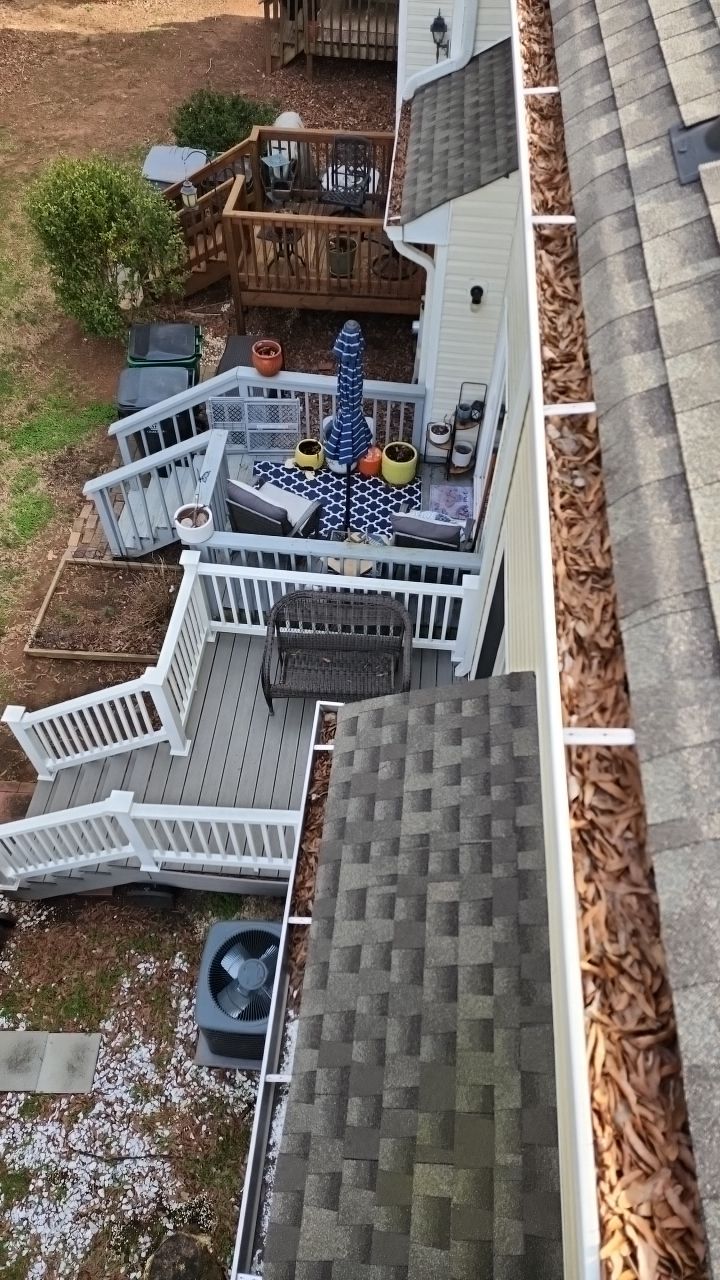 Gutter Cleaning using water by G&H Home Tech Pros LLC