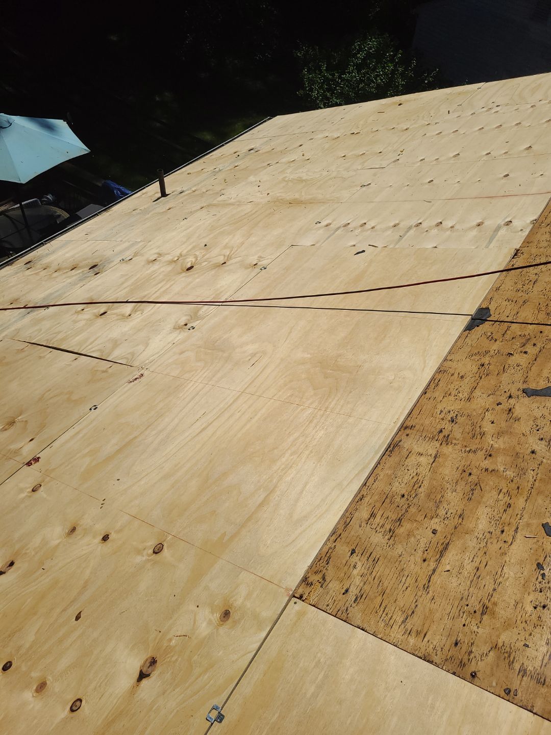 Burke: CertainTeed Landmark Designer Shingles in Moire Black by RM Banning, Inc.