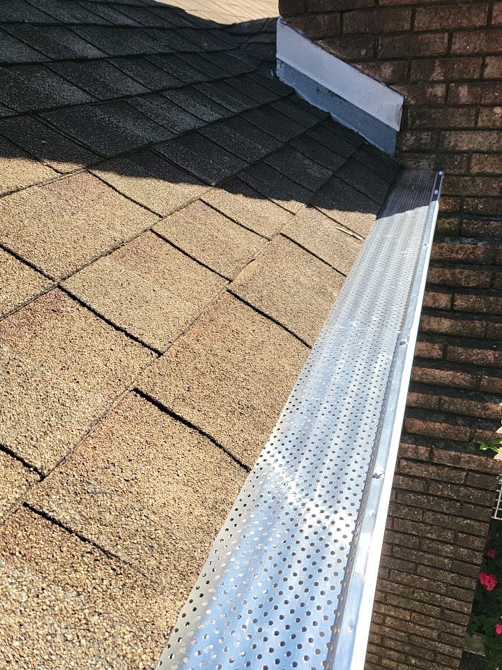 Seamless Gutter Installation using K-Style Seamless Gutters and LeafBlaster Pro Gutter Guards by Gutter Professors