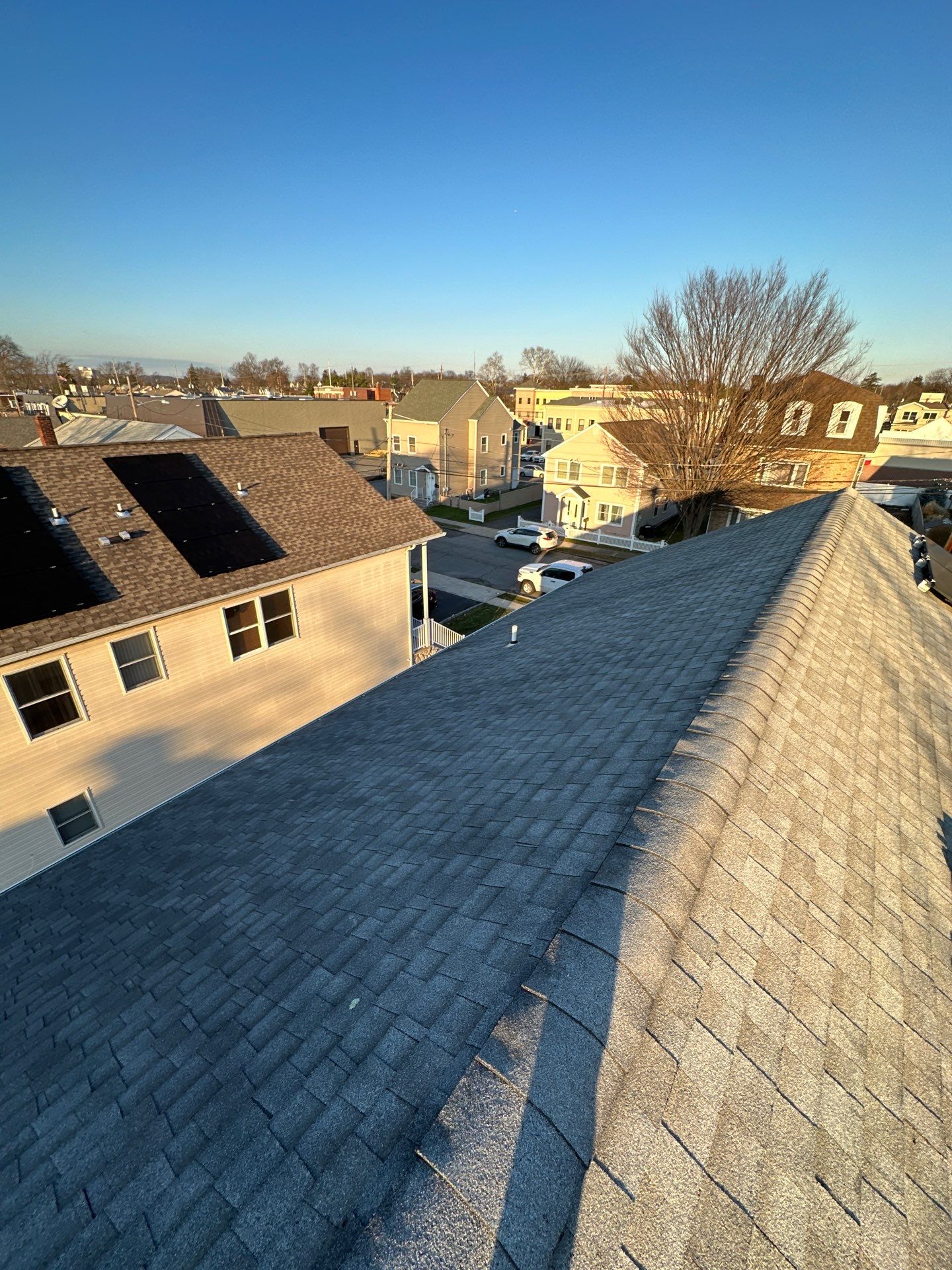 Charcoal Shingles by Reimagine Roofing