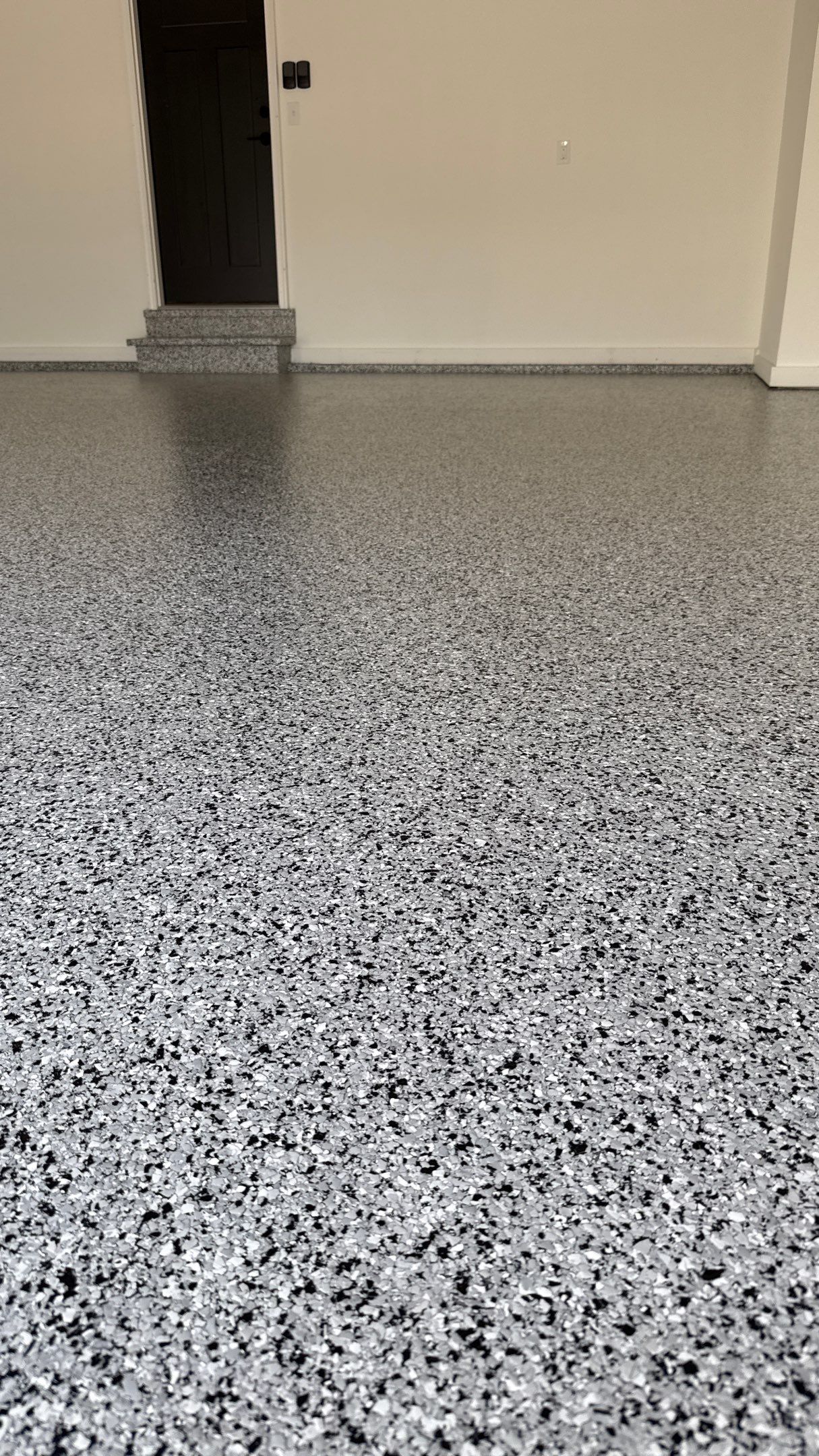 Joe Chose This Amazing Houndstooth Flake Floor by Banner Garage
