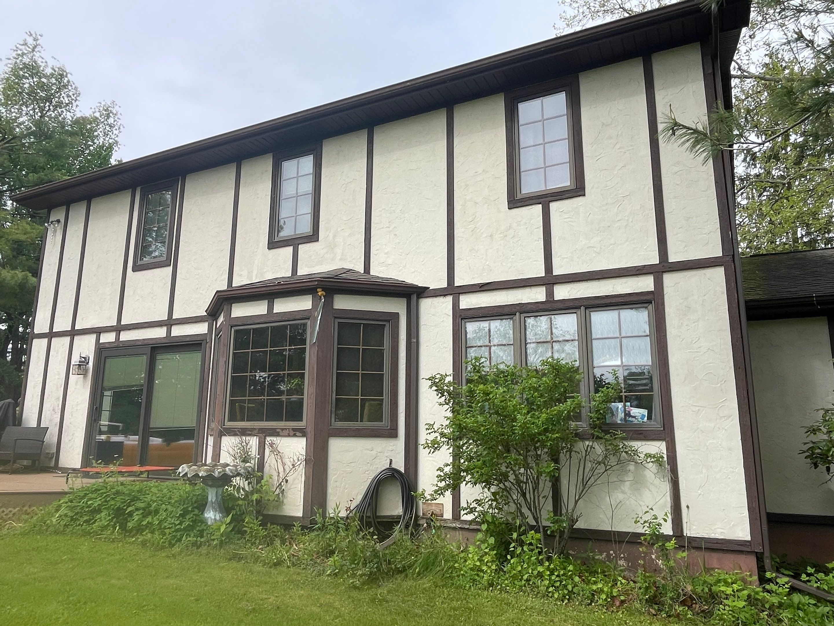 Vinyl Window & Siding Project in rand Ledge by 42 North Construction, LLC.