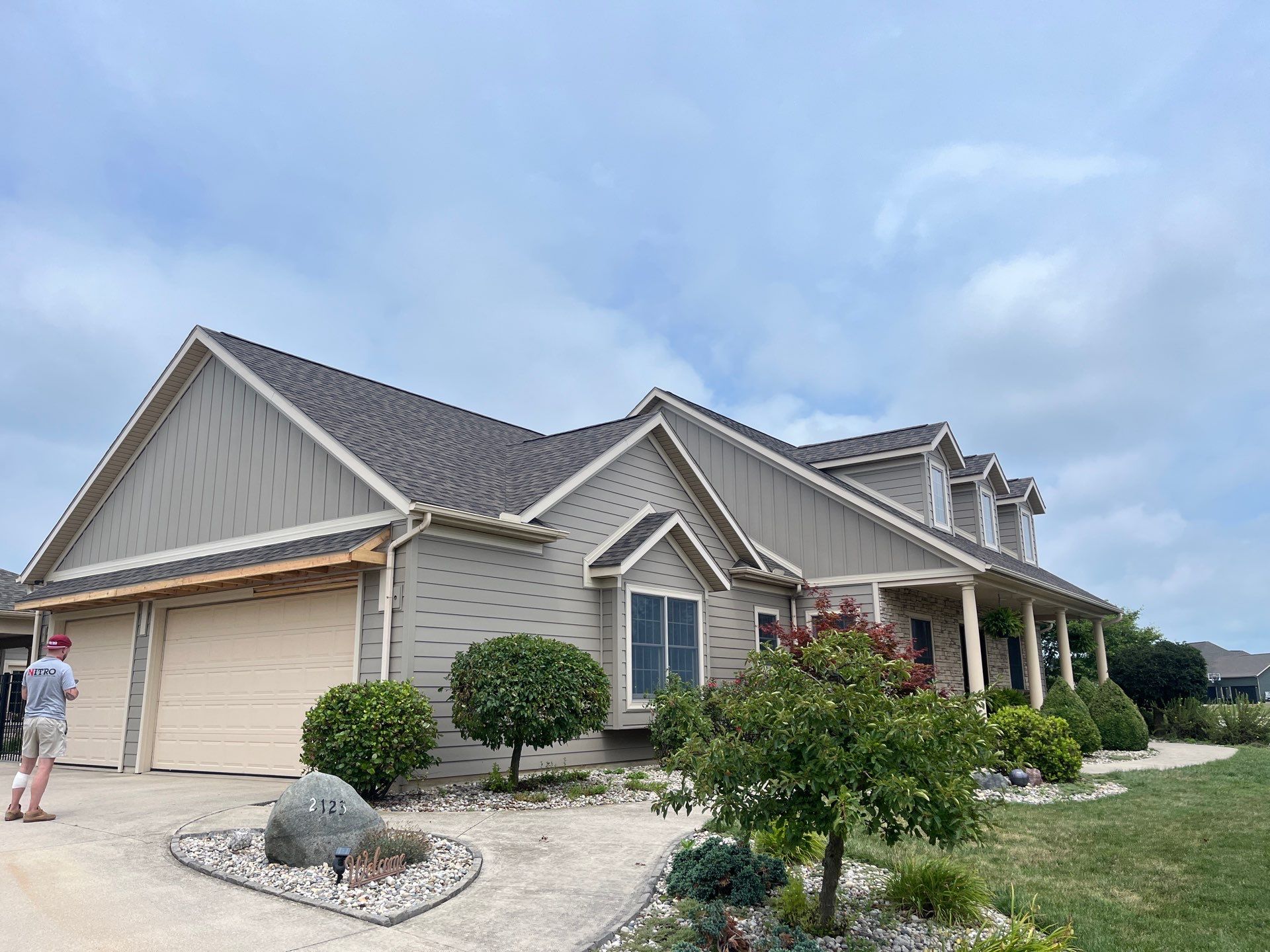 Siding Installation using Alside Ascend Board and Batten Pebblestone Clay by Nitro Roofing and Construction