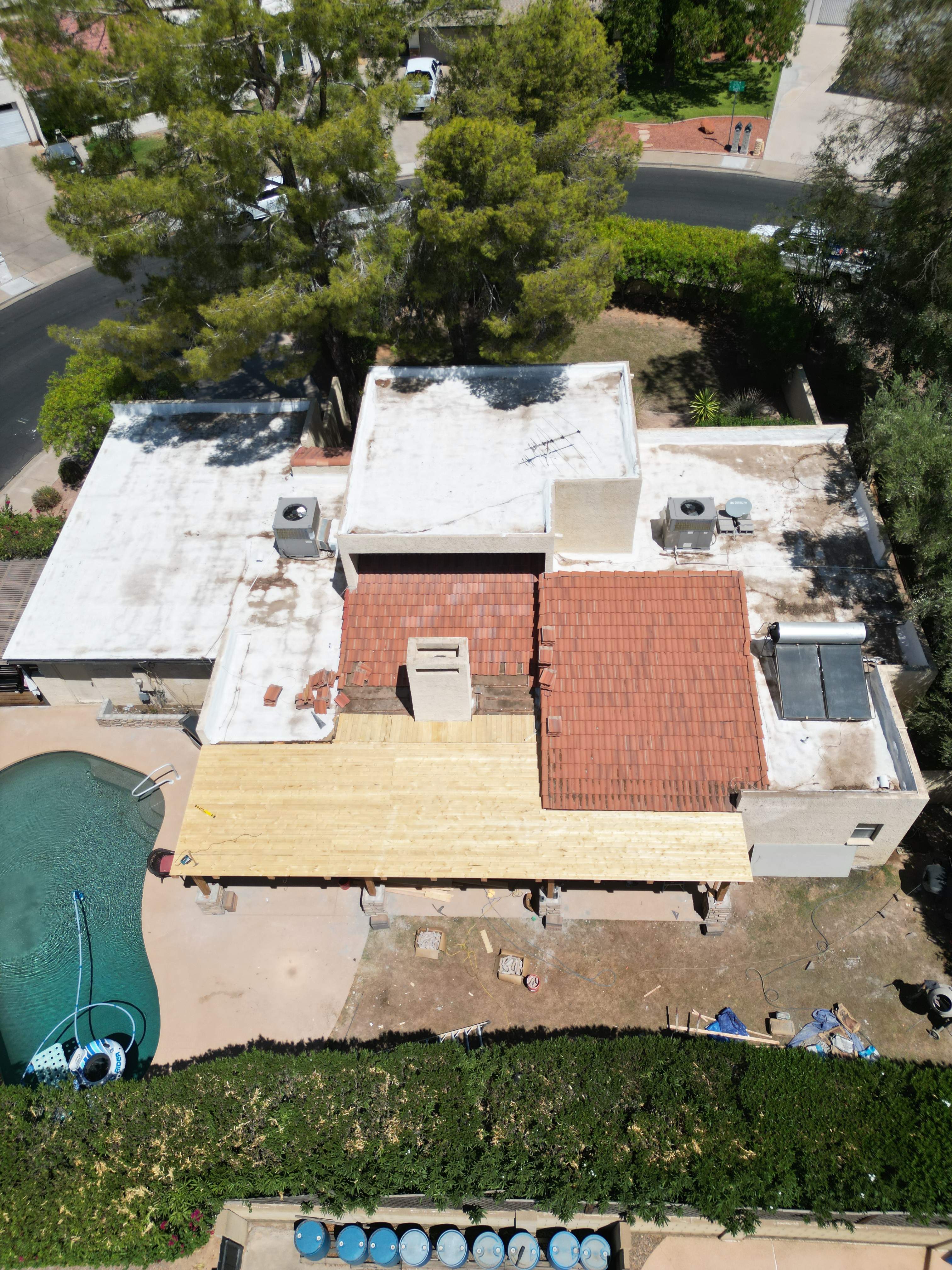Re-coat & Tile Job by All Storm Roofing & Construction