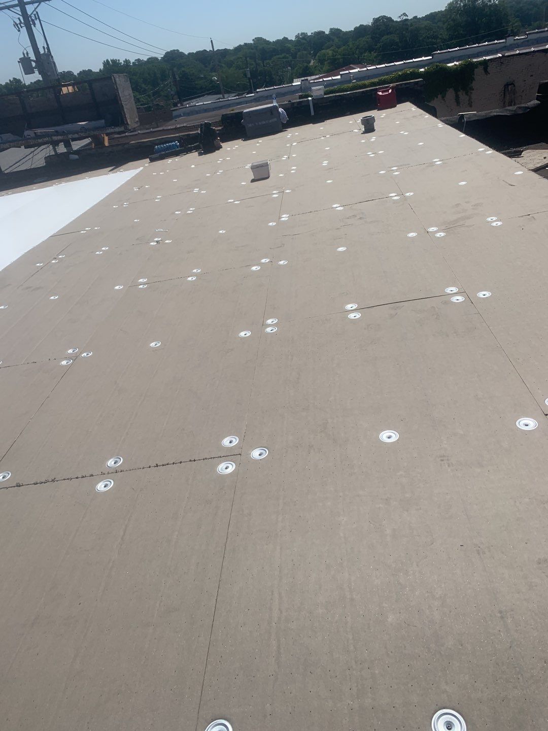Commercial Roofing Installation in DeQueen, AR, using 50 mil PVC by Hostetler Roofing