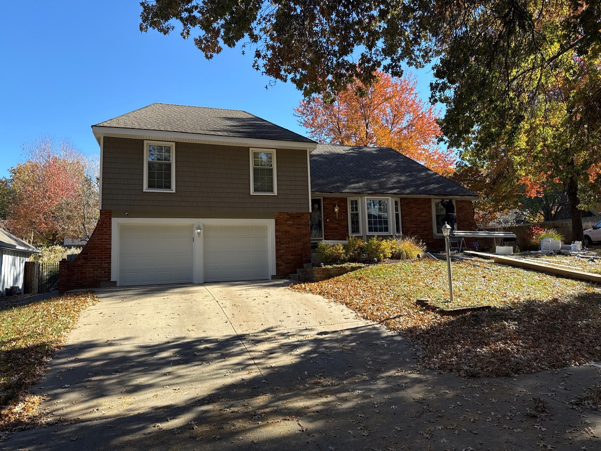 Complete Kansas City Exterior Remodel With IKO Roofing and Craneboard Siding by EEC Windows, Siding & Roofing