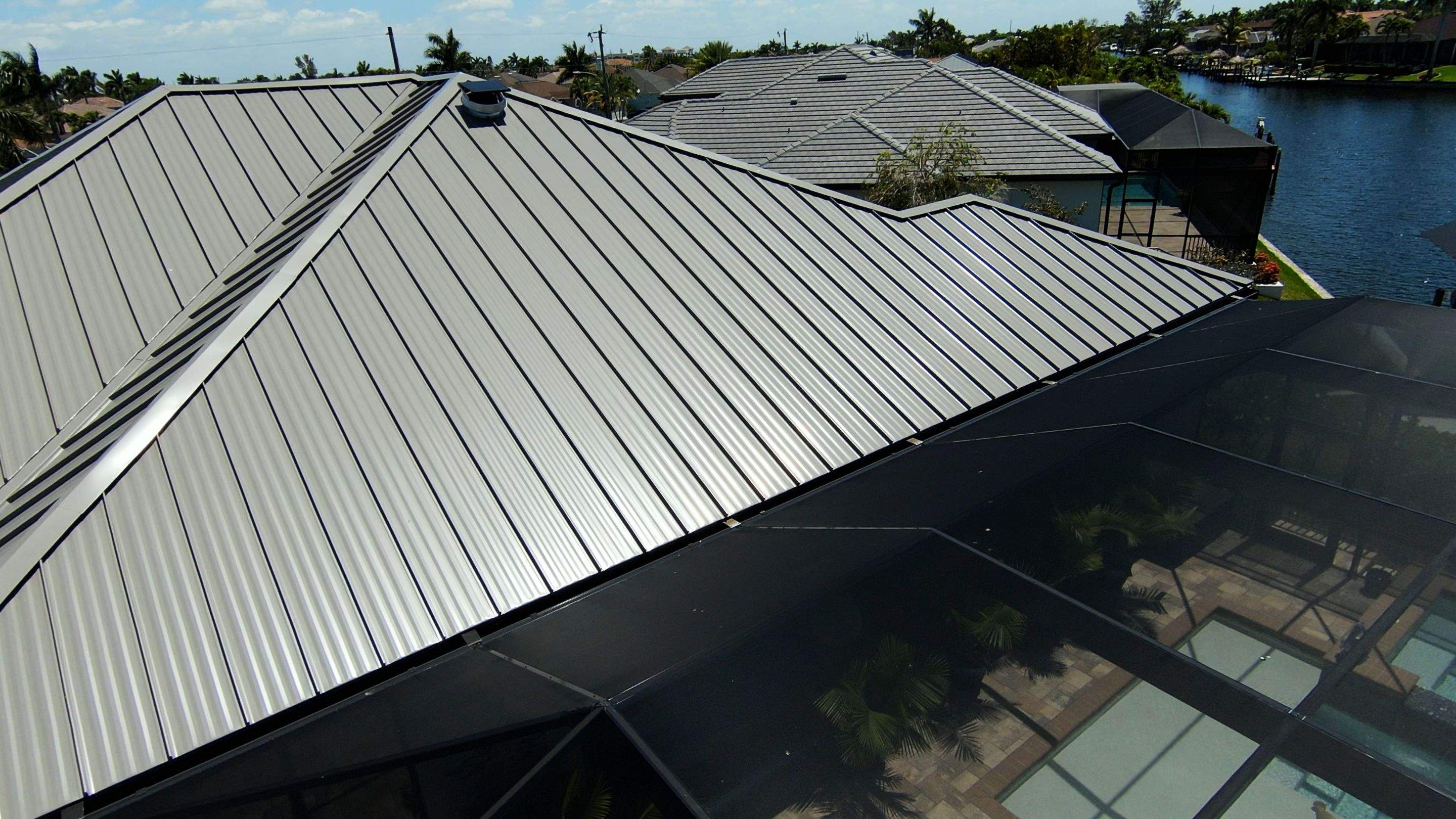 Residential Roofing Installation using Gulf Coast Metals Gulf Seam Panels by Four Peaks Roofing