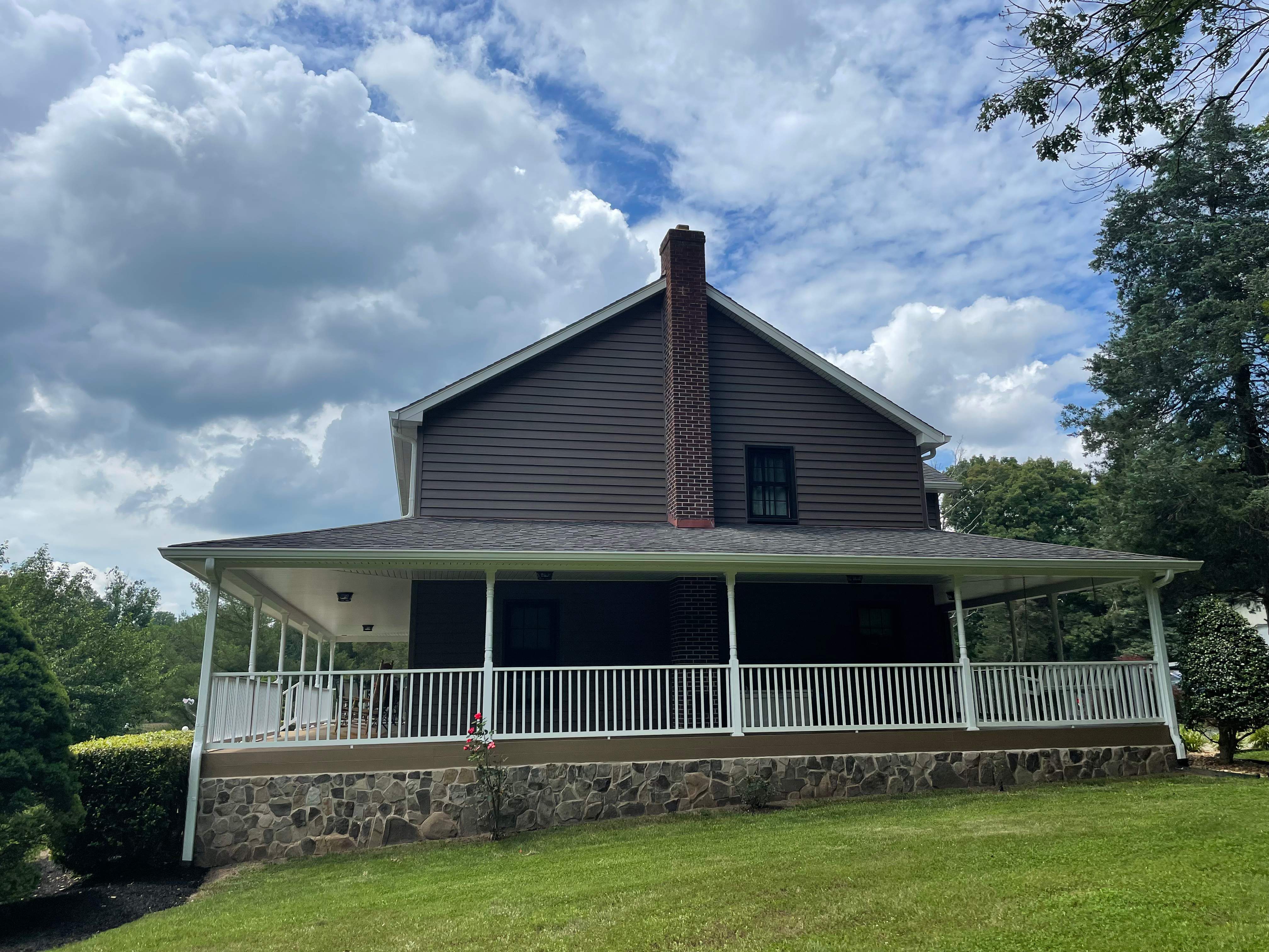 Exterior remodel including window replacement by American Home Contractors
