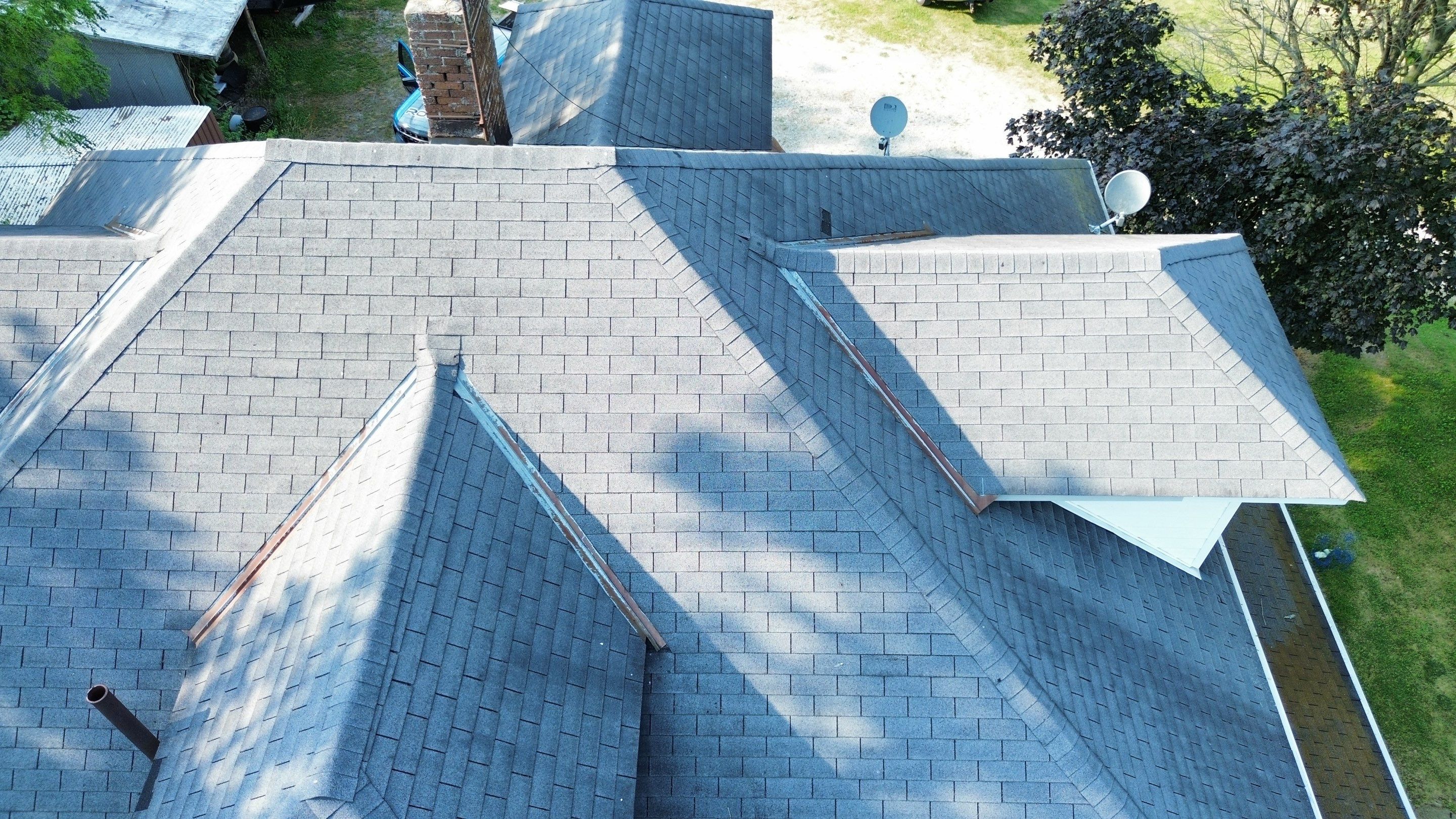 Residential Roofing Installation using Performance Panel Metal - Copper Metallic by RoofX 