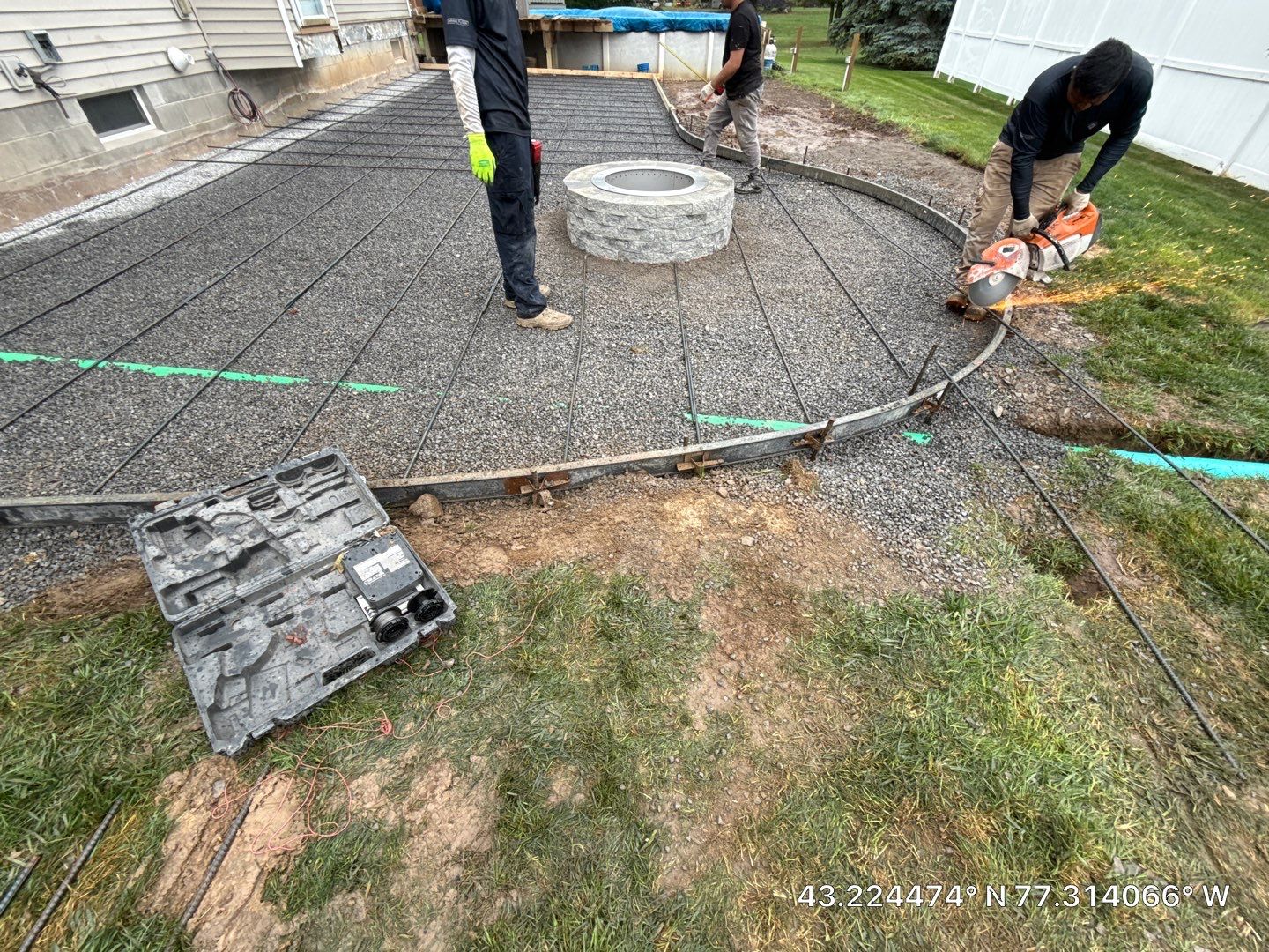 Oxford slate stamped concrete patio  by NG Masonry & Construction LLC