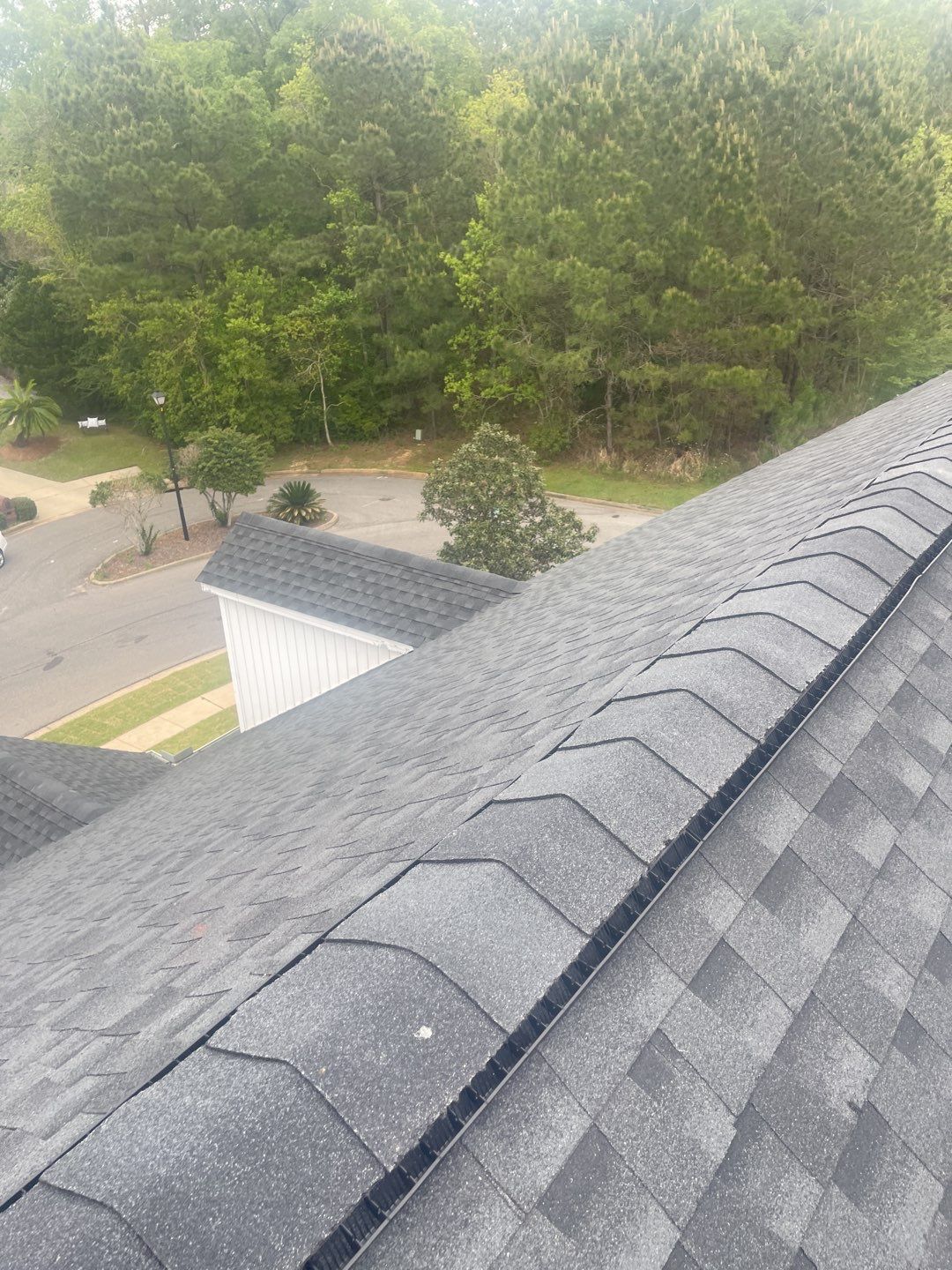 Residential Roofing Installation using Roof Replacement by American Roofing & Construction LLC