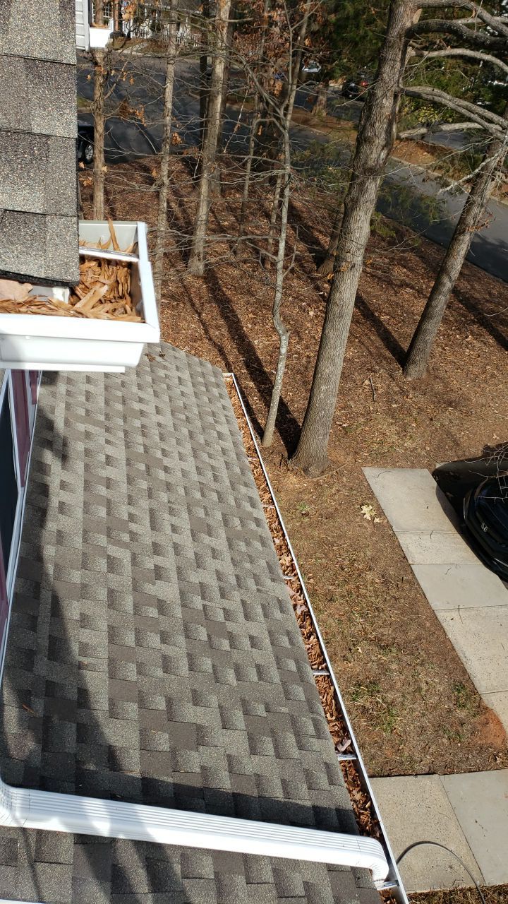Gutter Cleaning using water by Power Wash Masters LLC