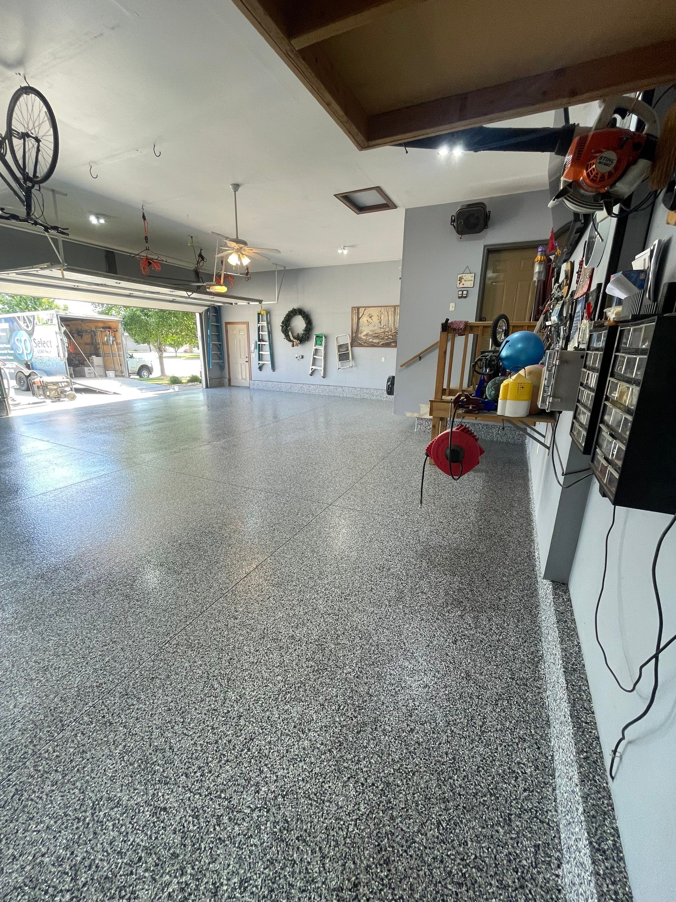 Residential Garage Floor Coating in Sioux Falls by Select Painting, Coatings & Garage Cabinets