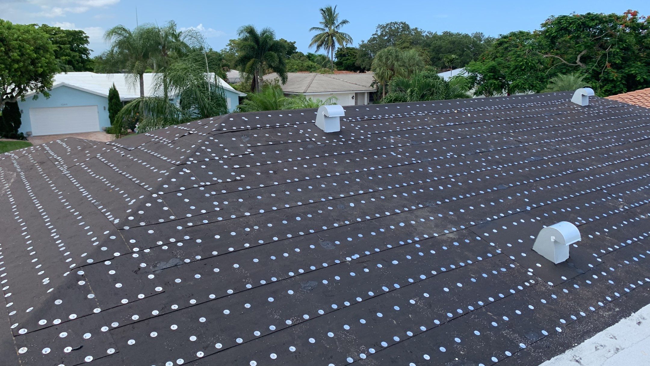 Residential Roofing Installation using 1" Nail strip metal roof by BLUES BROTHERS ROOFING