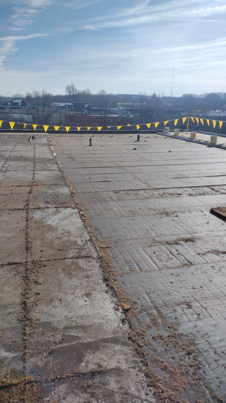 Commercial flat roof parma by Absolute Roofing and Construction