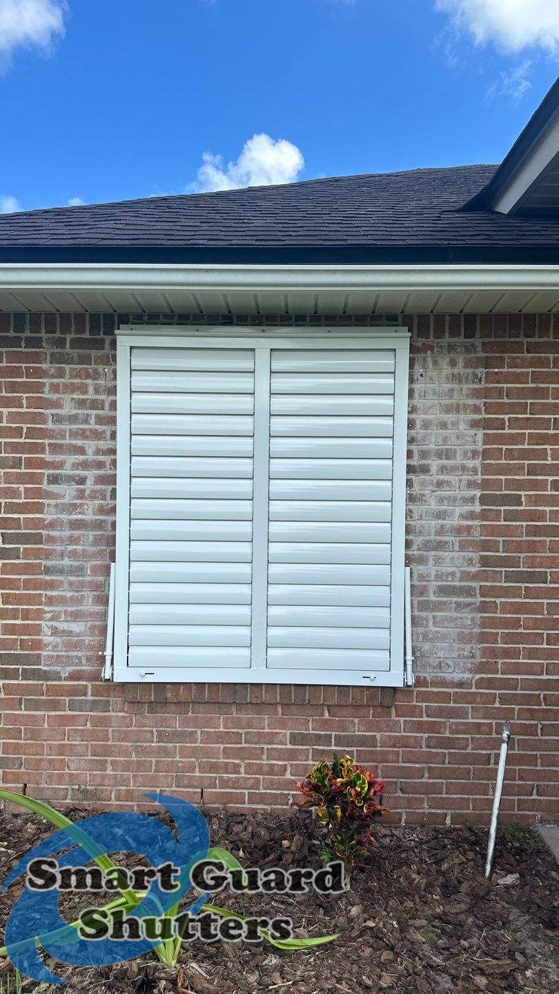 Impact Bahama Shutters in Signal White by Smart Guard Shutters
