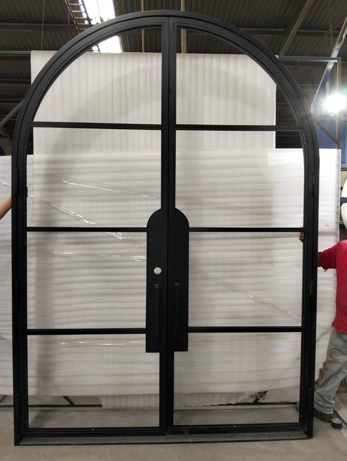 Custom Arched Metal Entry Door Installation in Plano by Solara Custom Living