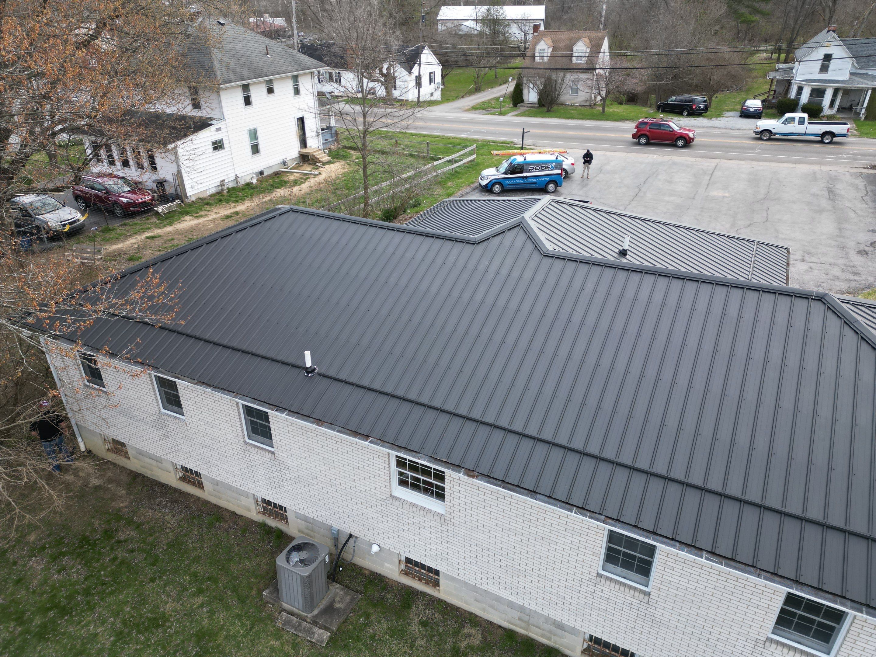 Commercial Roofing Installation using Performance Panel Metal - Frost Black by RoofX 